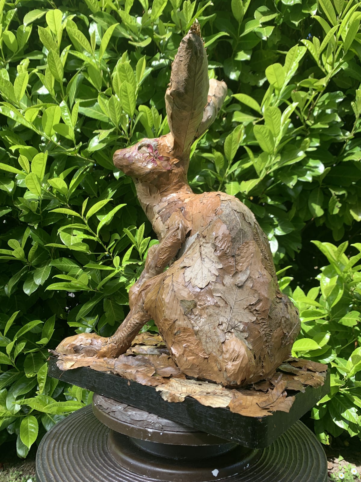 Sitting leafy hare sculpture by Stephen Charlton.