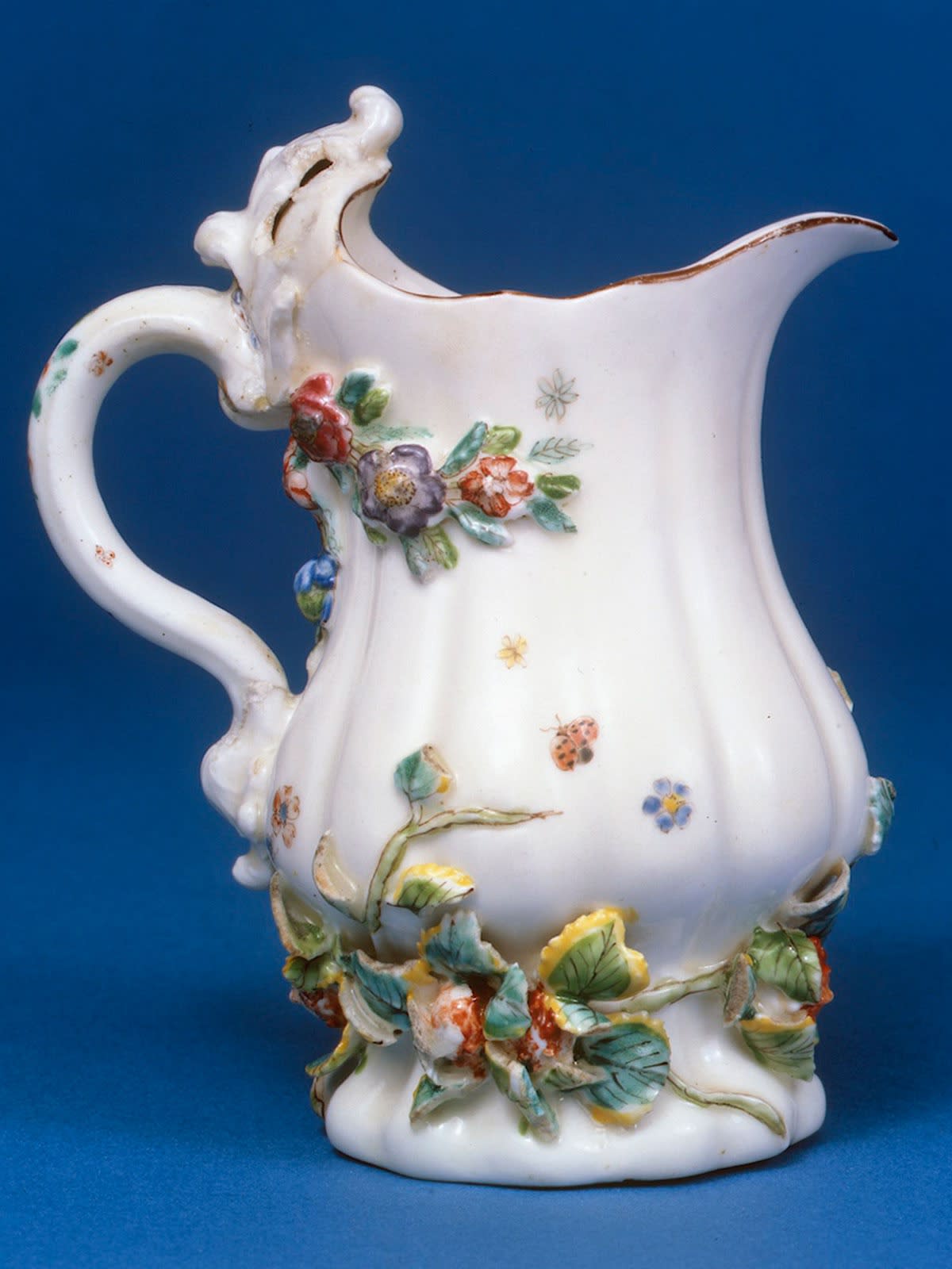 Chelsea Silver Shaped Creamjug, encrusted with flowers and leaves, Circa 1745-49