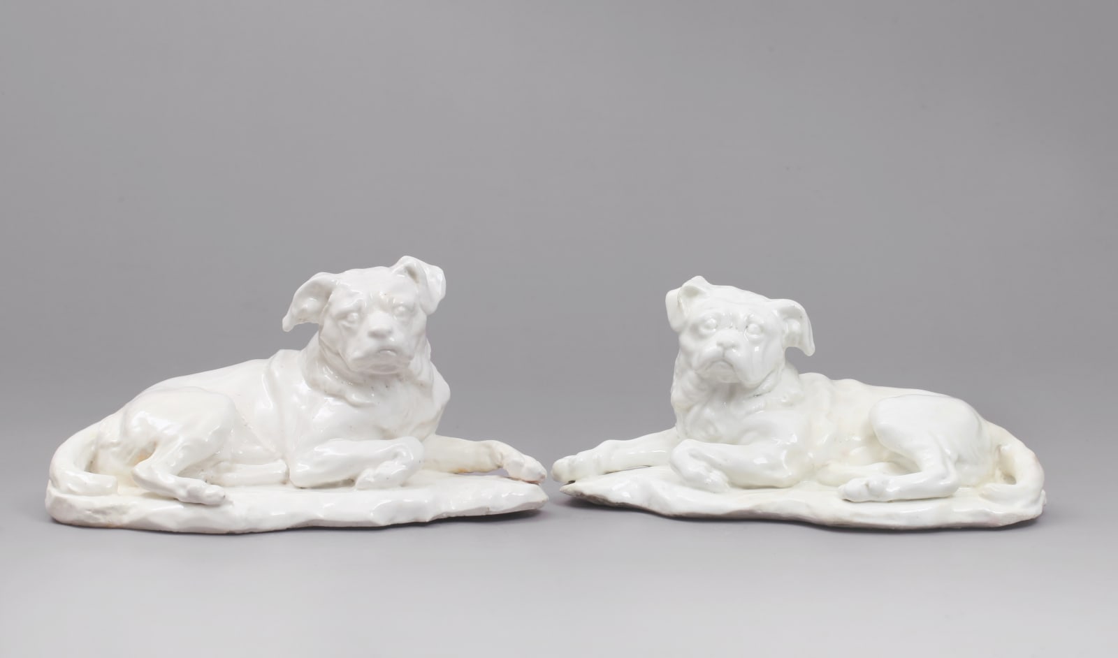 The Important Pair of Chelsea Porcelain Models of Hogarth’s Dog Trump, after the Model by Louis- Francois Roubiliac Of the Incised Triangle Period, Circa 1747-50