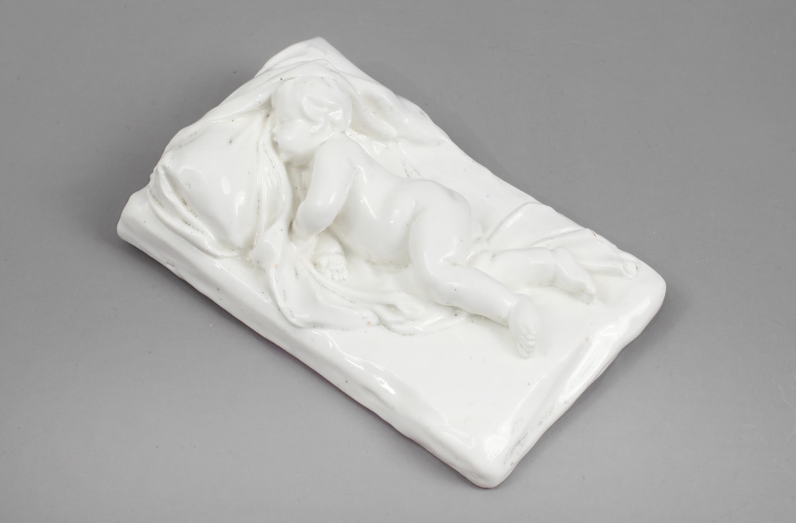 Rare and Important Chelsea Incised Triangle Period Porcelain Model of a Sleeping Child , Circa 1746