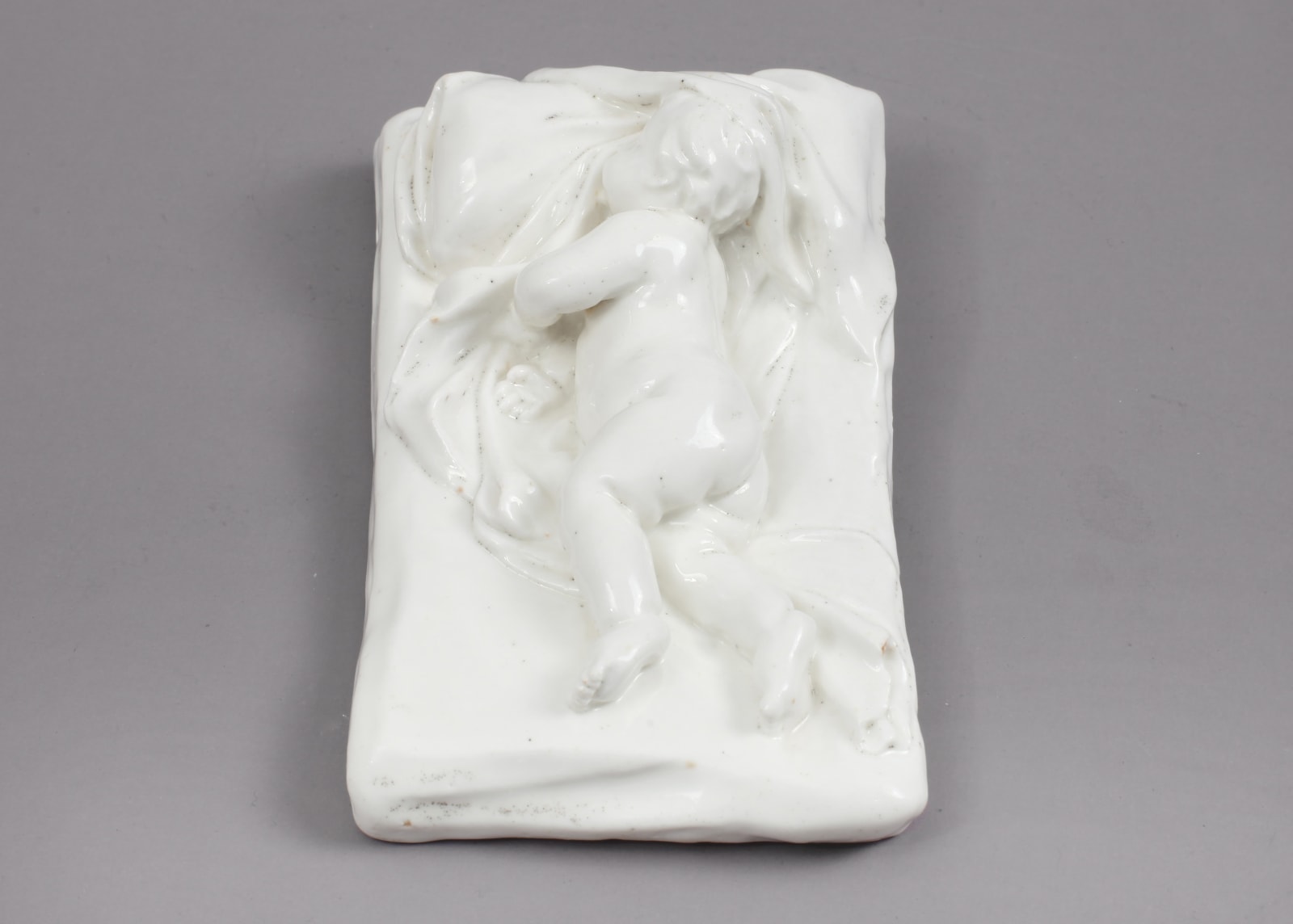 Rare and Important Chelsea Incised Triangle Period Porcelain Model of a Sleeping Child , Circa 1746