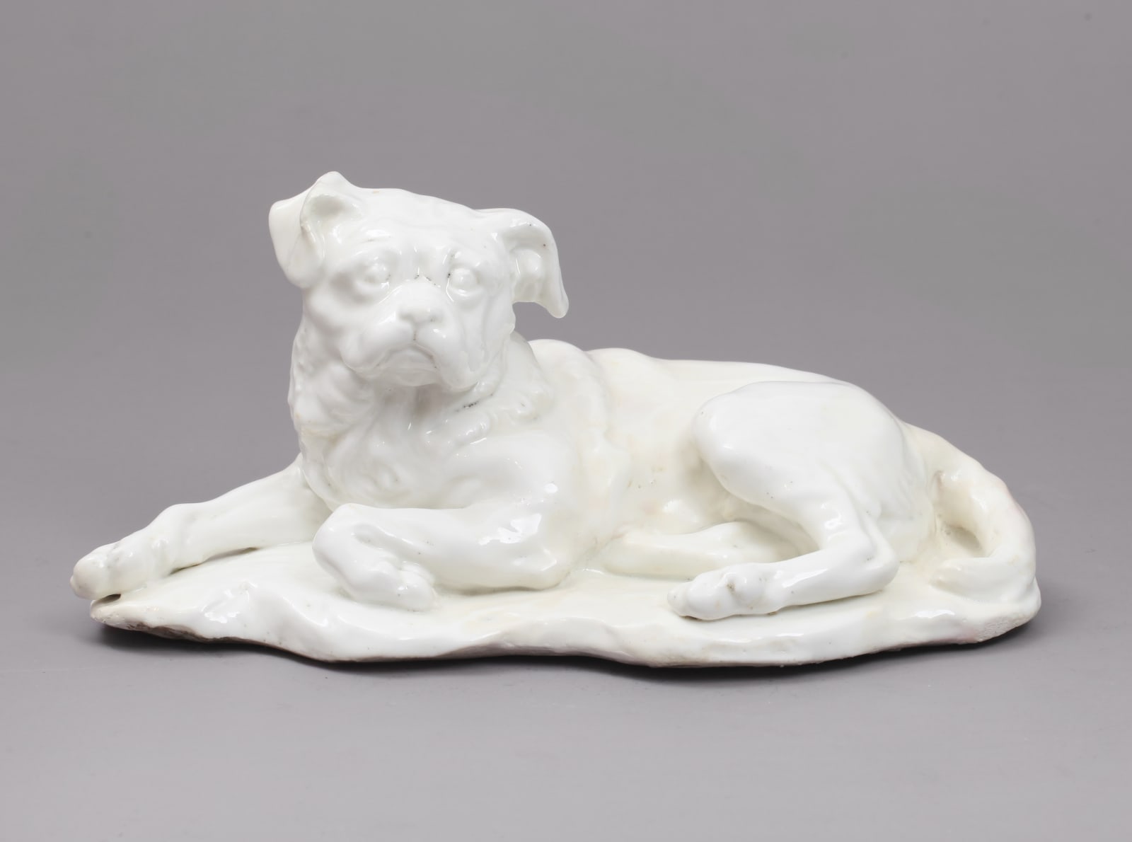 The Important Pair of Chelsea Porcelain Models of Hogarth’s Dog Trump, after the Model by Louis- Francois Roubiliac Of the Incised Triangle Period, Circa 1747-50