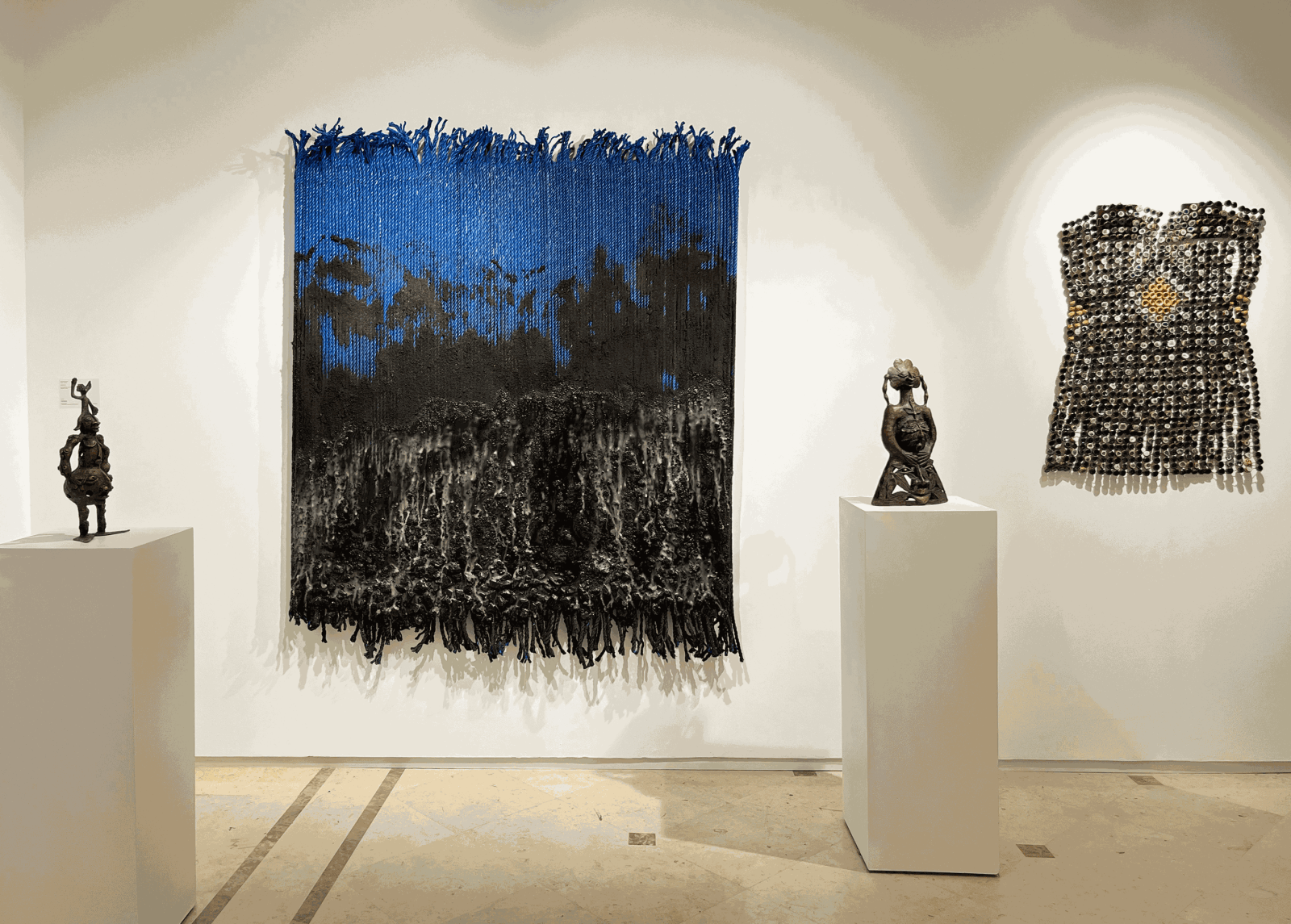 Mouhcine Rahaoui, Hervé Yamguen and Ozioma Onuzulike's works at 1-54 Marrakech on AFIKARIS Gallery booth