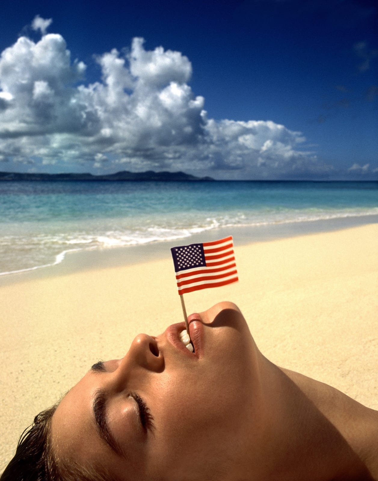 Albert Watson, Cindy Crawford with Flag, U.S. Virgin Islands, 1993