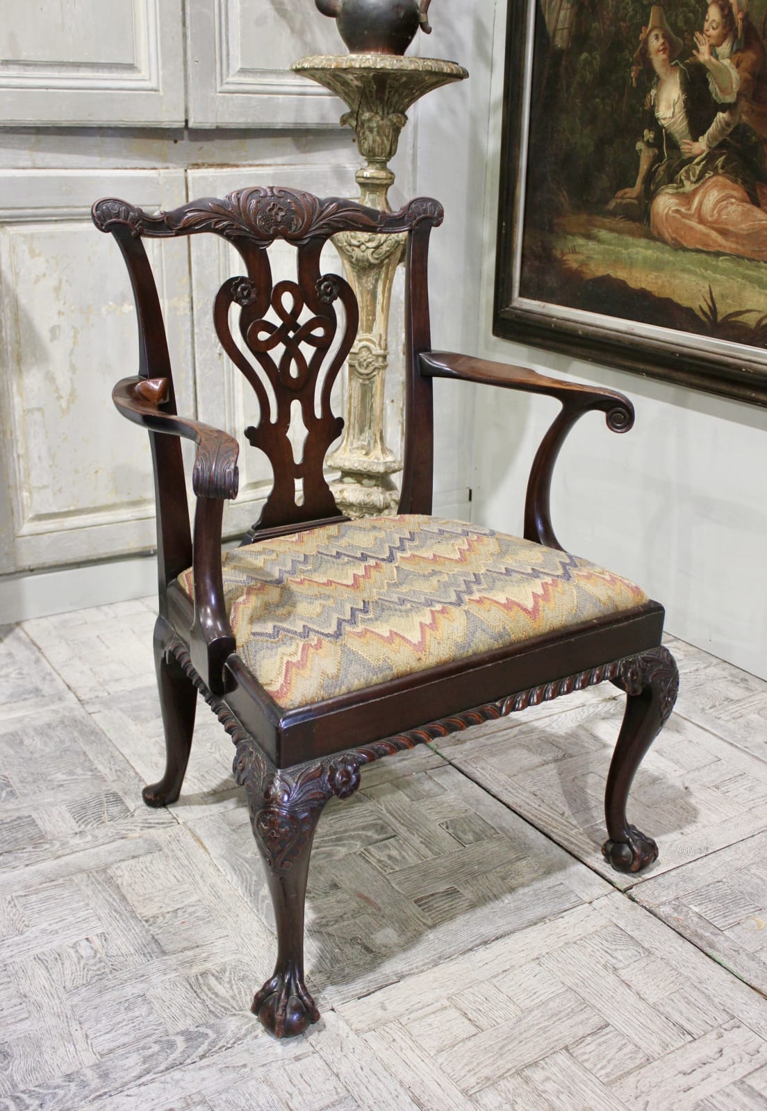 19th century English carved mahogany armchair in the 18th century manner with a bargello covered drop in seat