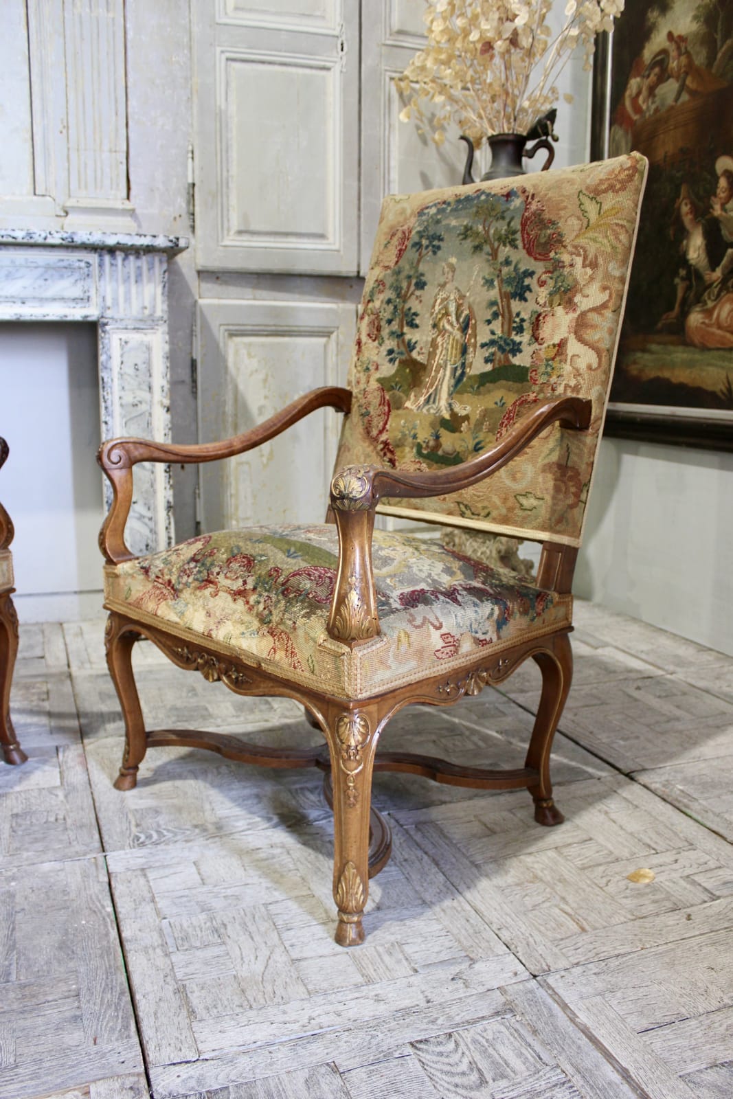 Pair of 19th century French walnut and parcel gilt armchairs, Mid-19th century