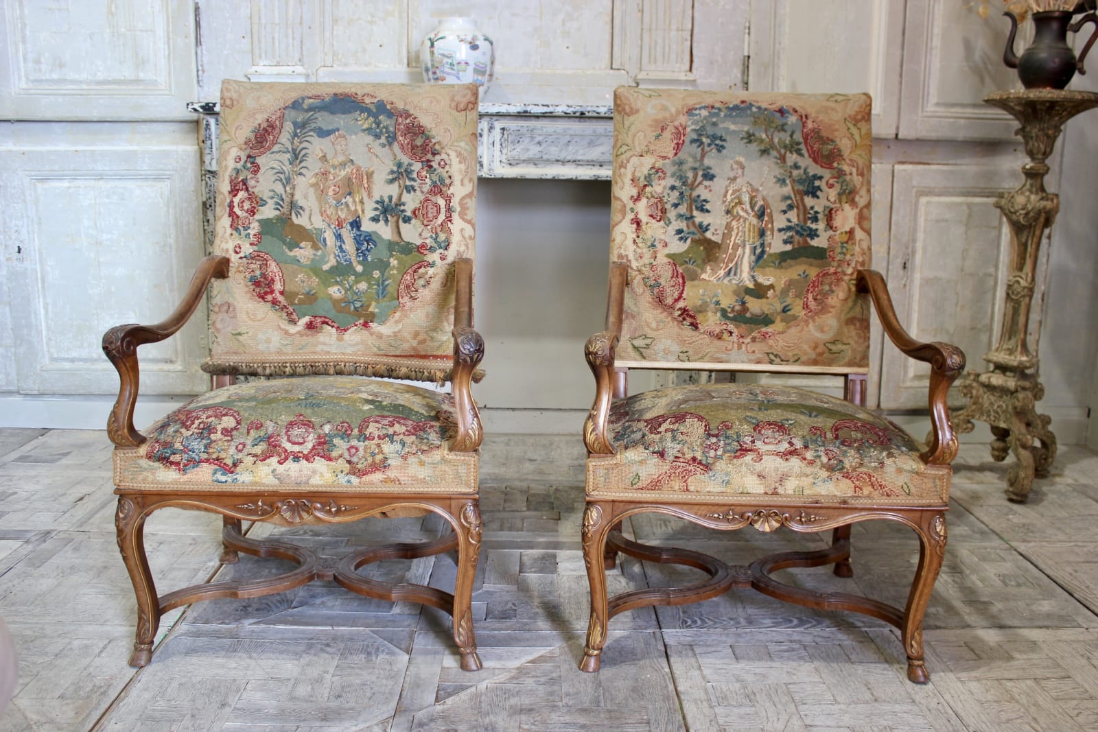 Pair of 19th century French walnut and parcel gilt armchairs, Mid-19th century
