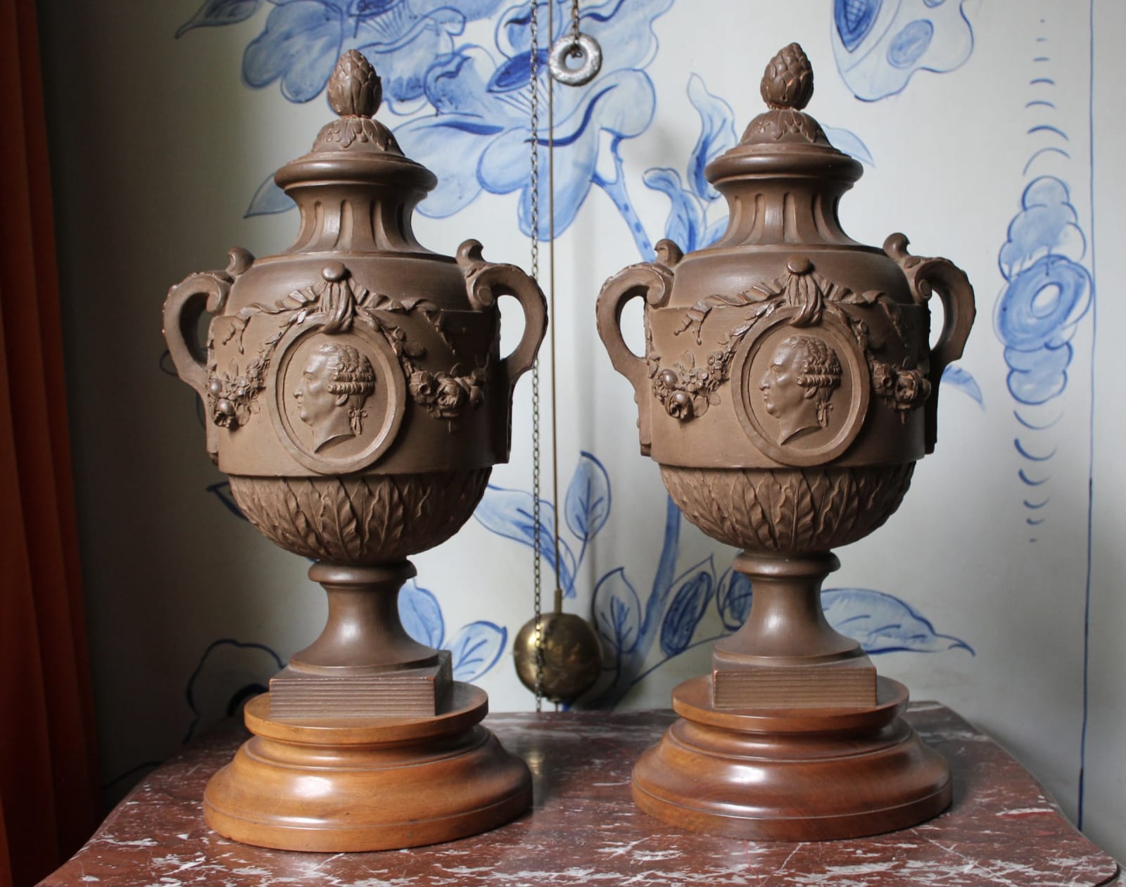 Pair of French terracotta portrait urns, 19th century