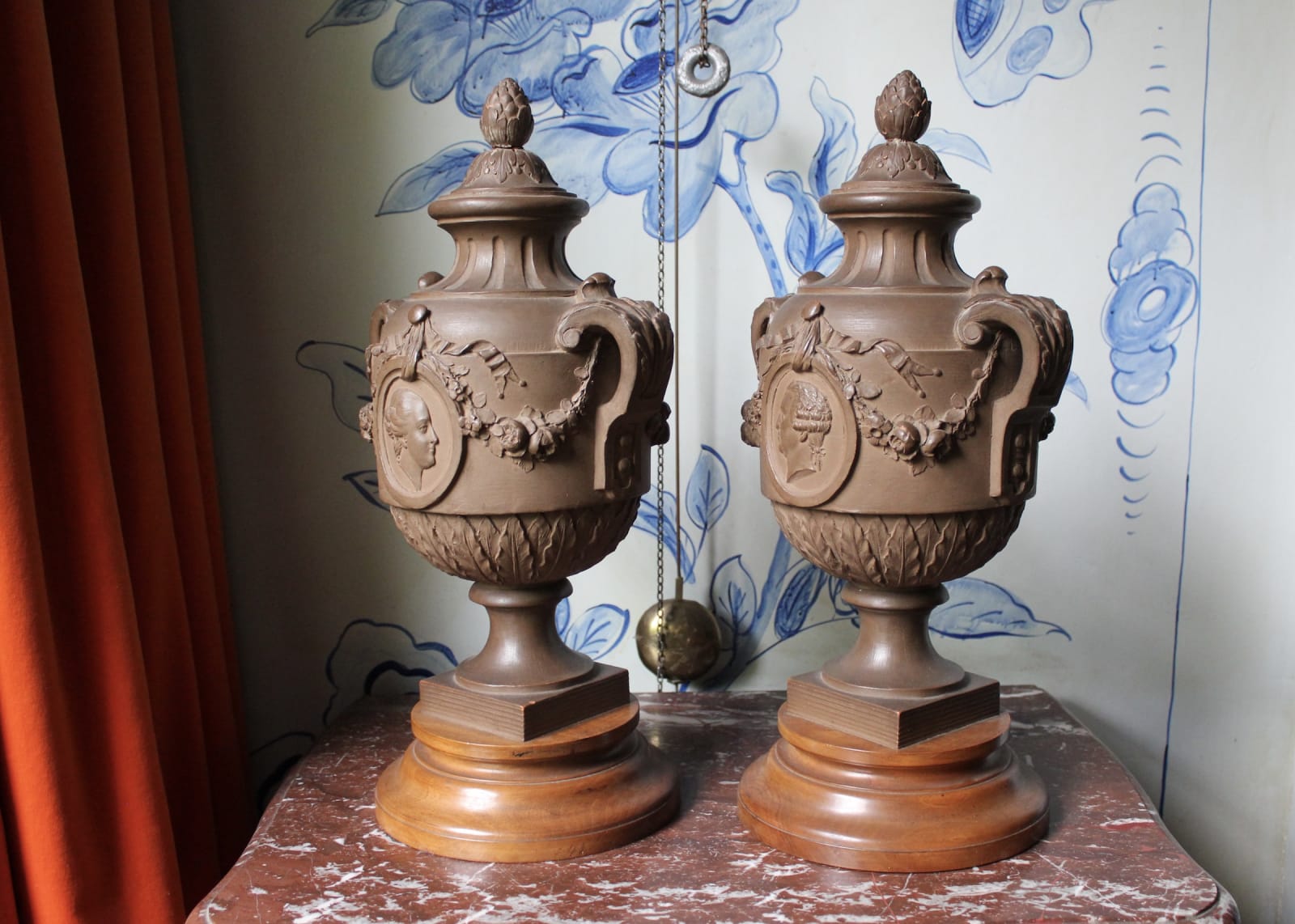 Pair of French terracotta portrait urns, 19th century