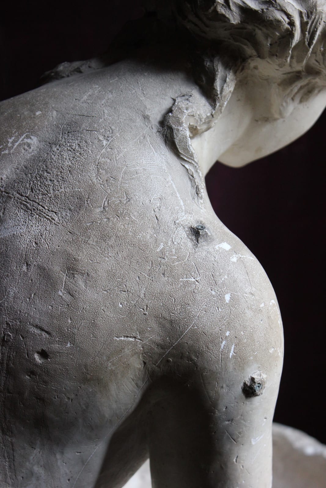 Large, atmospheric classical plaster figure of a water carrier, Late 19th/early 20th century