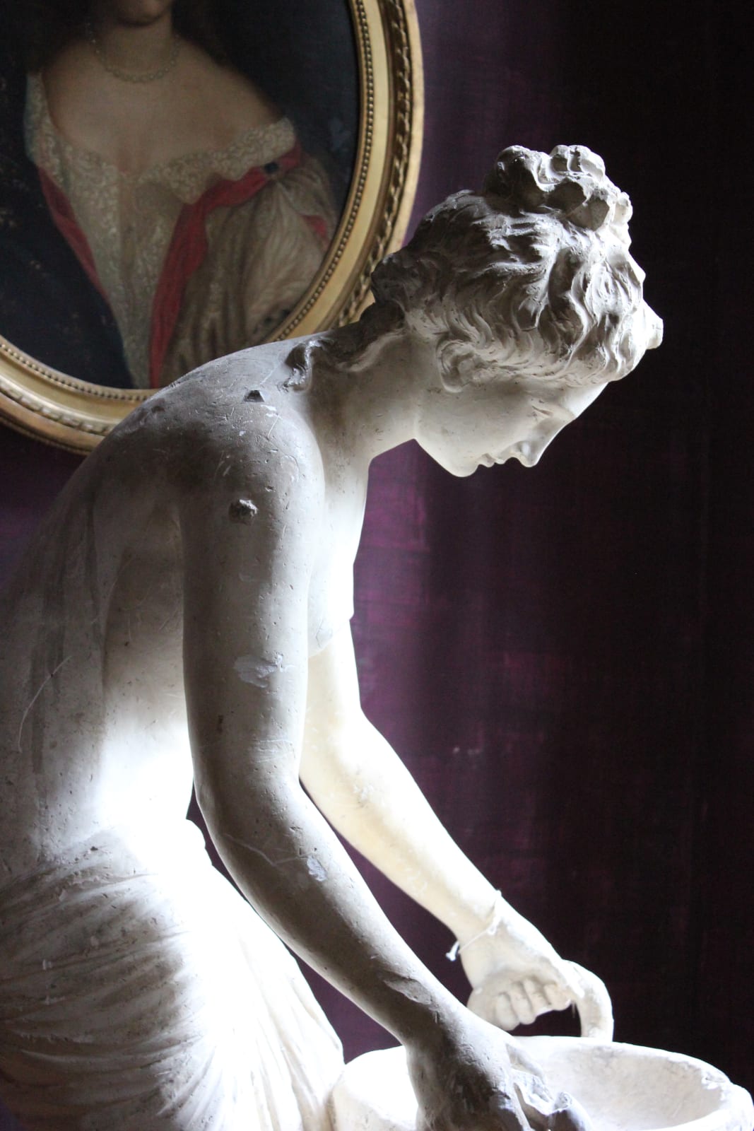 Large, atmospheric classical plaster figure of a water carrier, Late 19th/early 20th century