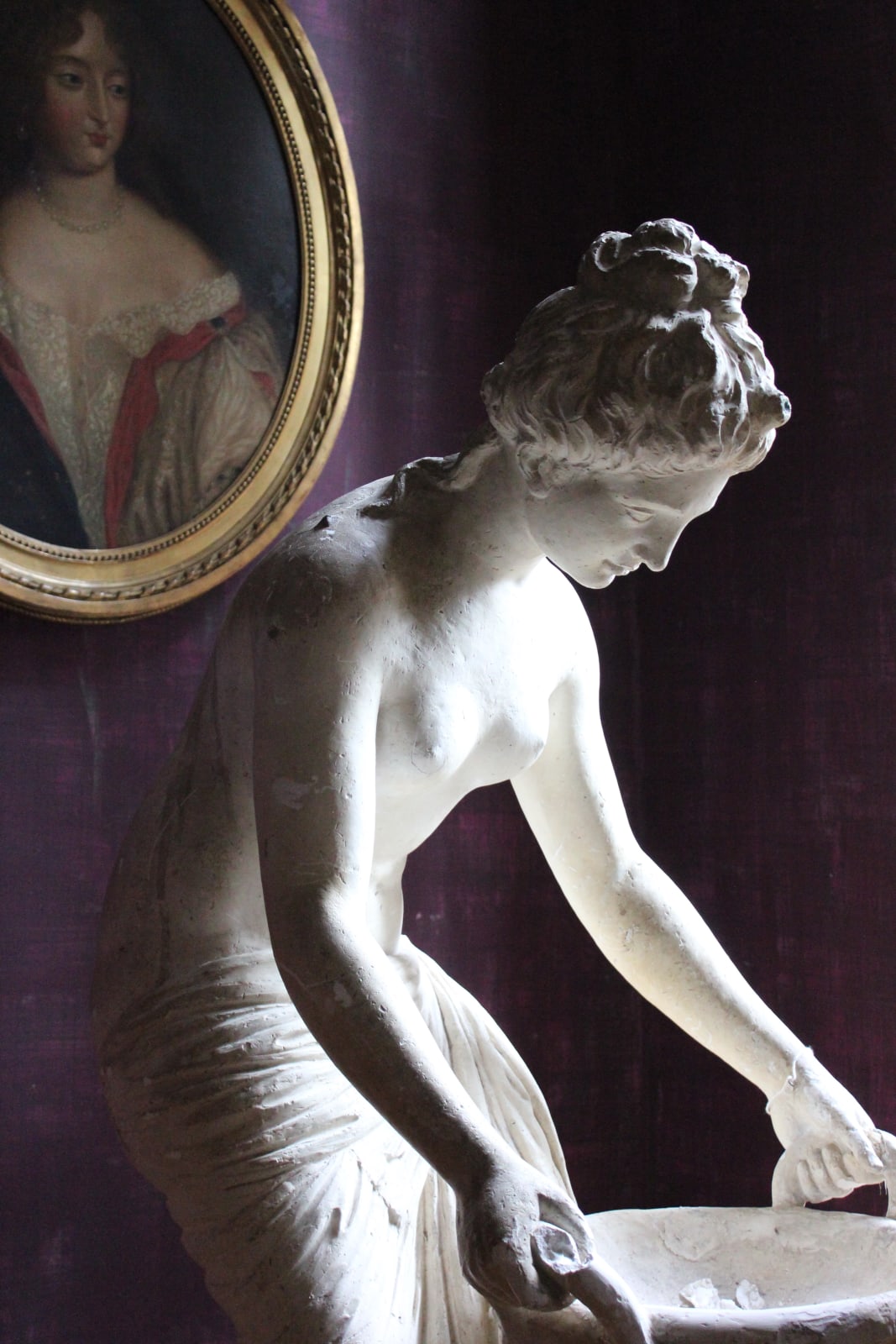 Large, atmospheric classical plaster figure of a water carrier, Late 19th/early 20th century
