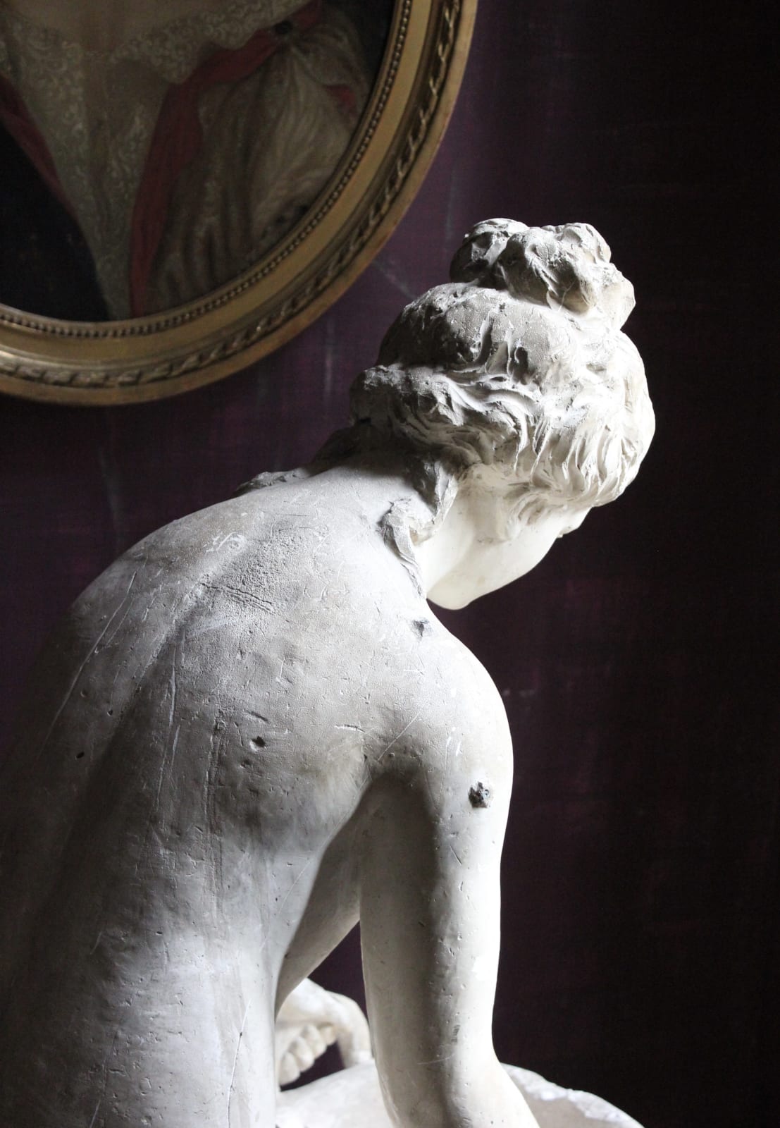 Large, atmospheric classical plaster figure of a water carrier, Late 19th/early 20th century