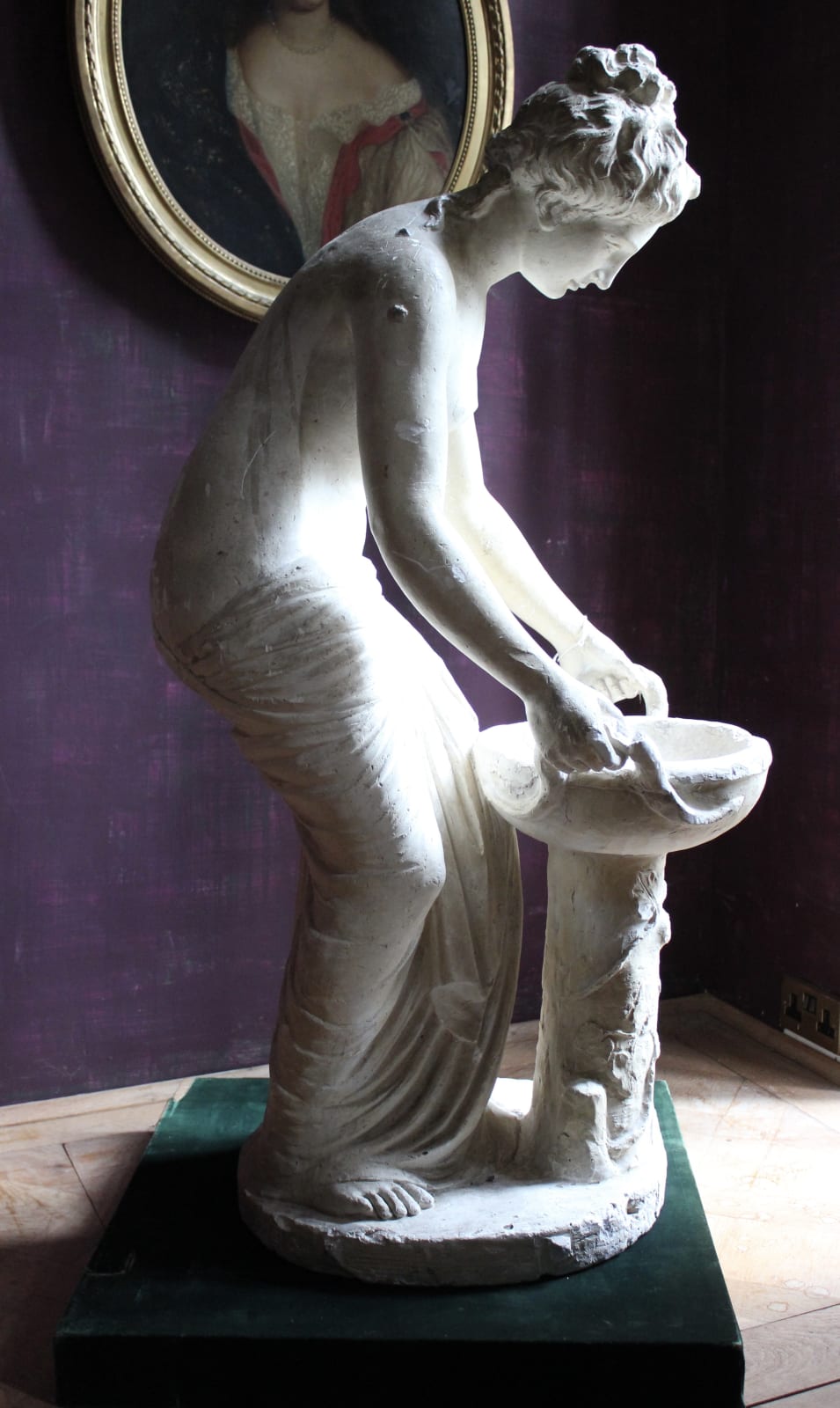 Large, atmospheric classical plaster figure of a water carrier, Late 19th/early 20th century
