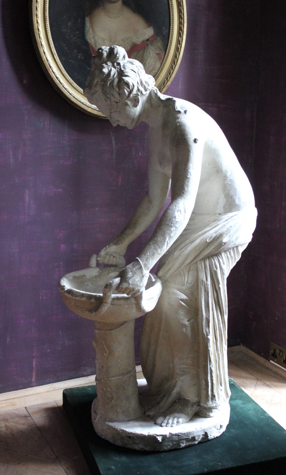 Large, atmospheric classical plaster figure of a water carrier, Late 19th/early 20th century