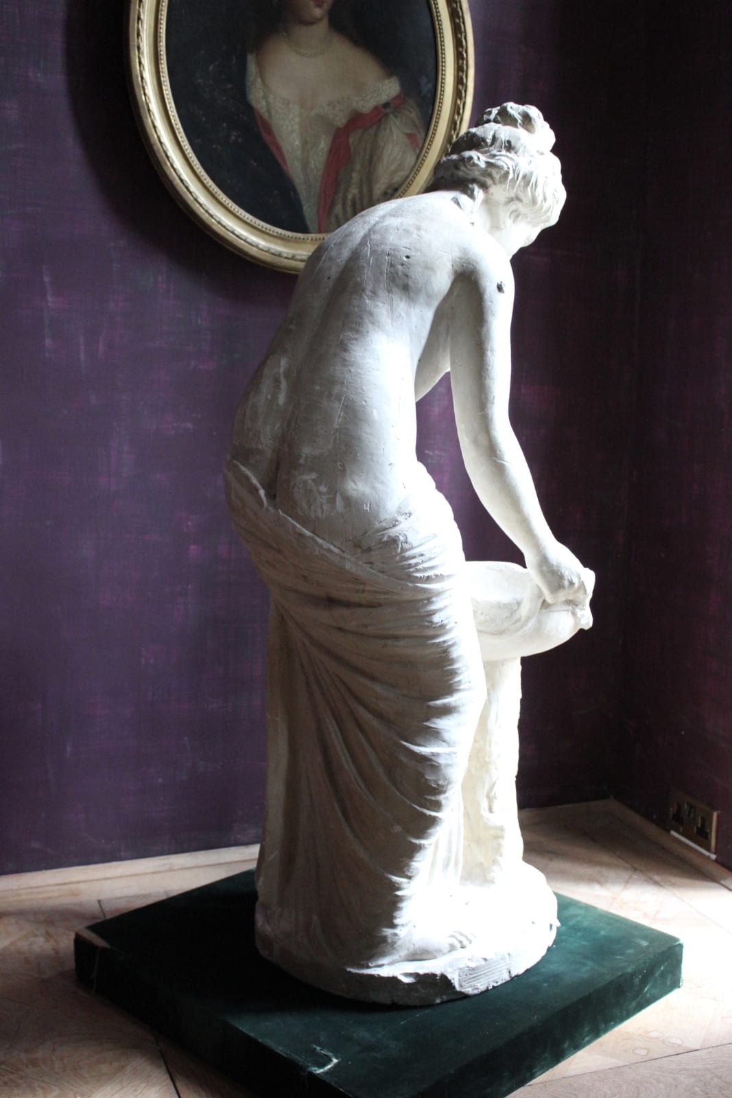 Large, atmospheric classical plaster figure of a water carrier, Late 19th/early 20th century