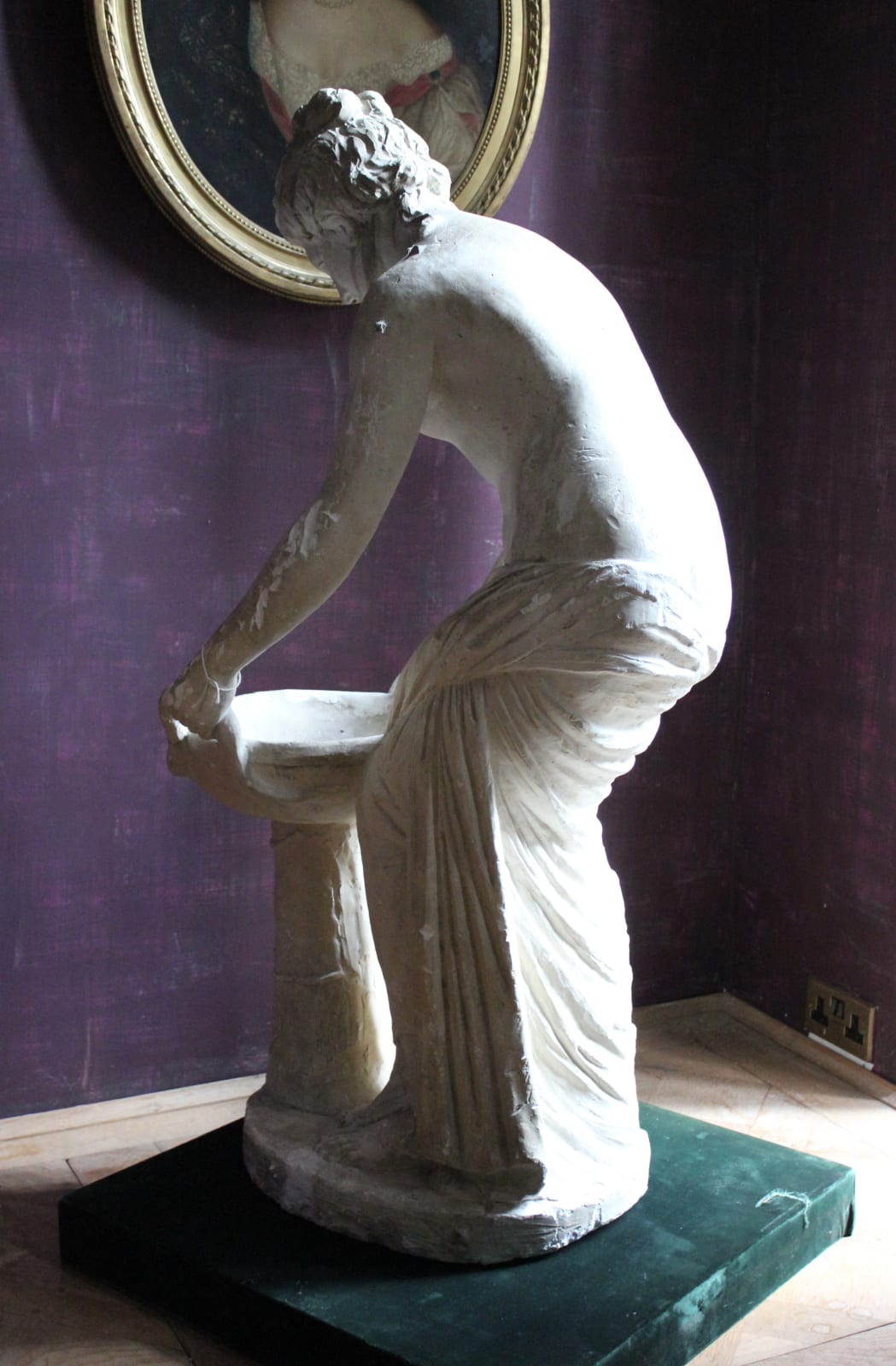 Large, atmospheric classical plaster figure of a water carrier, Late 19th/early 20th century
