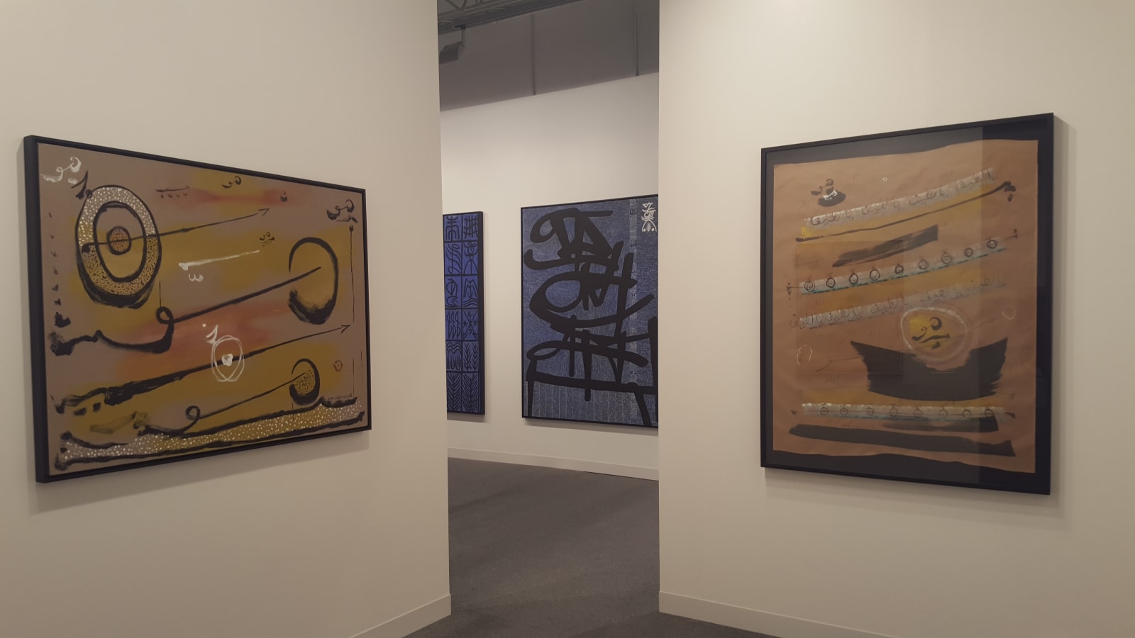 Right to left: Khaled Ben Slimane, Untitled, 2015; Rachid Koraichi, Lettre Bleue à ma mère, 2015; Khaled Ben Slimane, Ascension II, 2015