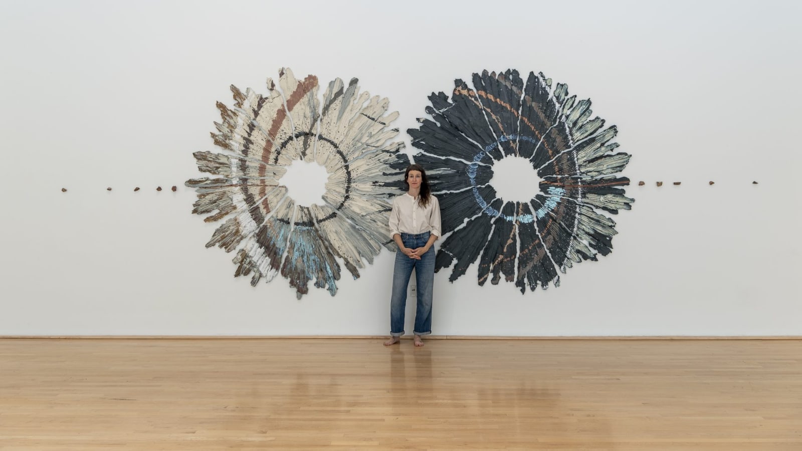 The artist with her work in Brie Ruais: Movement at the Edge of the Land. Photo by Nash Baker, courtesy of the Moody Center for the Arts, Rice University, Houston