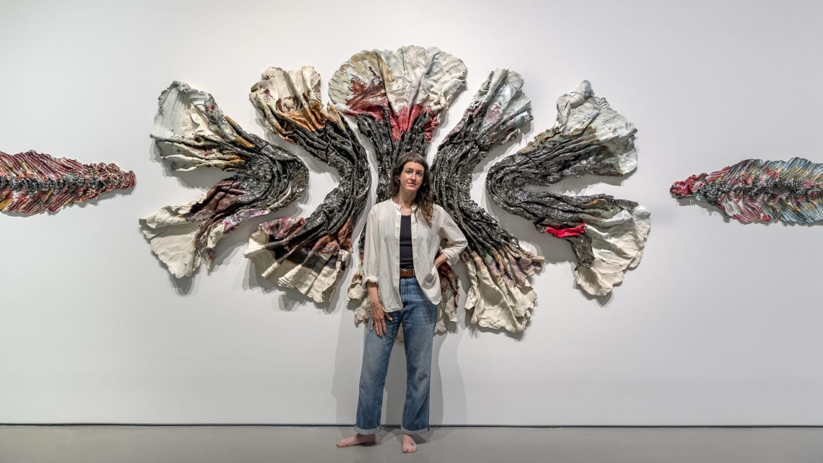 The artist with her work in Brie Ruais: Movement at the Edge of the Land. Photo by Nash Baker, courtesy of the Moody Center for the Arts, Rice University, Houston