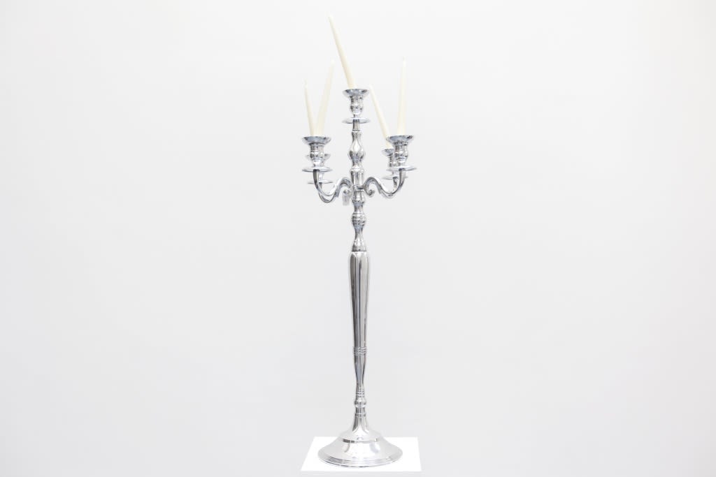 Hans-Peter Feldmann, Candles holder with crossed candles