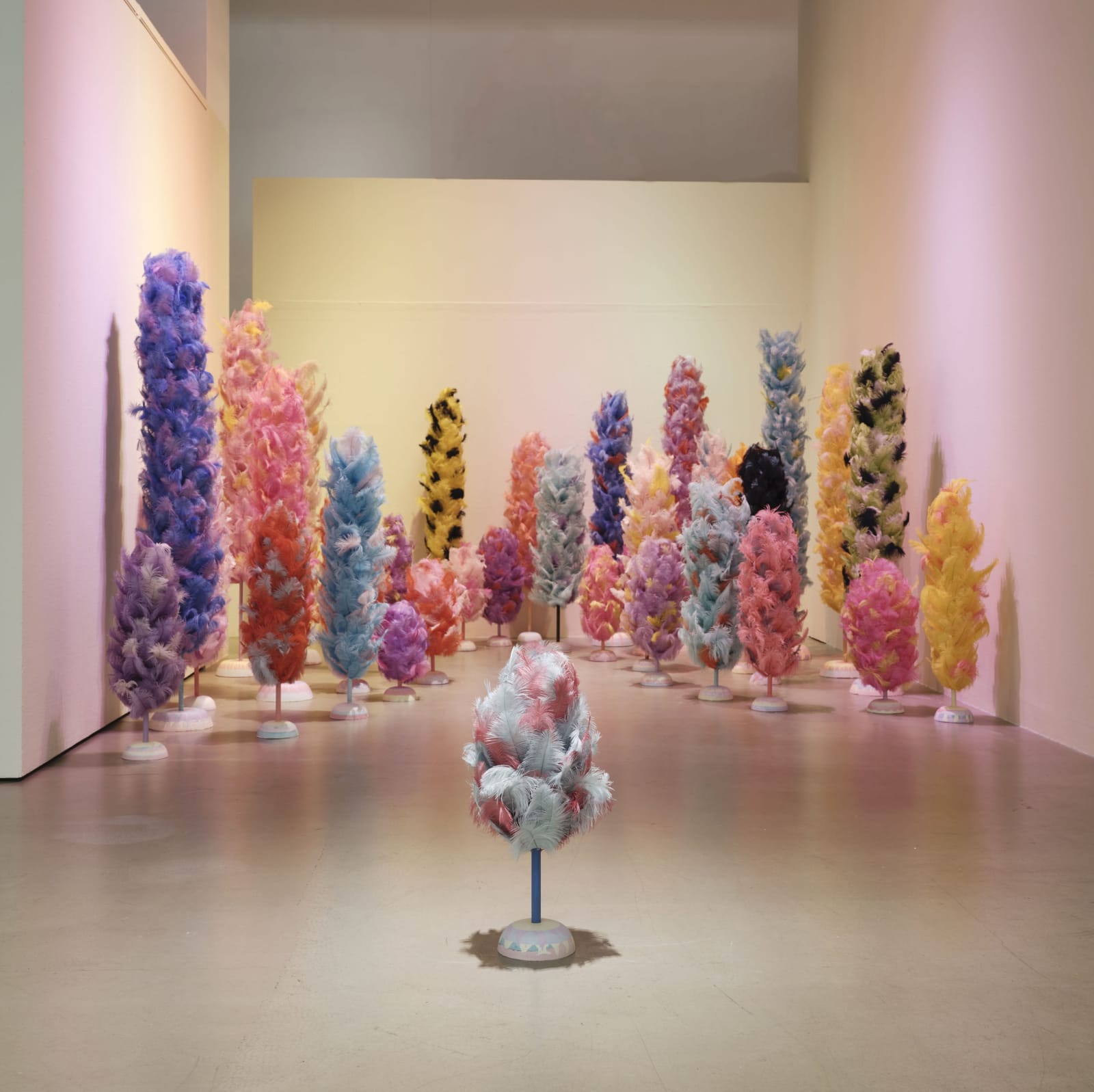 Duster Clump, 2017, ostrich Feather, PVC pipe, plaster, pigment, perfume, dimensions variable