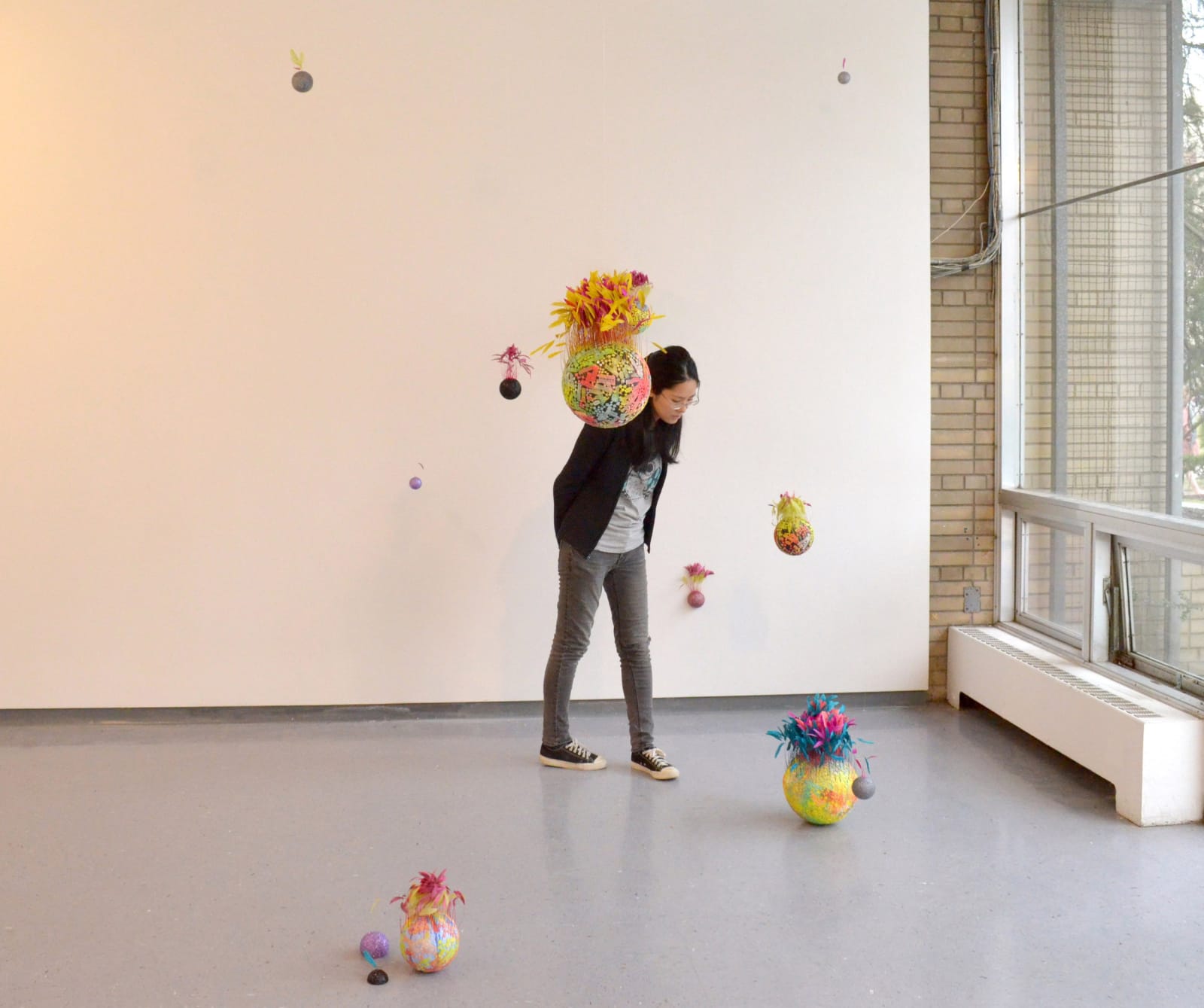 Conundrum, 2017, feather, styrofoam, pattern fabric, acrylic, glitter, dimensions variable