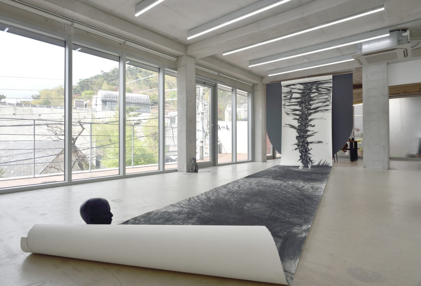 Untitled Record, 2023, charcoal, compressed charcoal, conte on paper (Fabriano Artistico, variable installation), 1000 x 140 cm