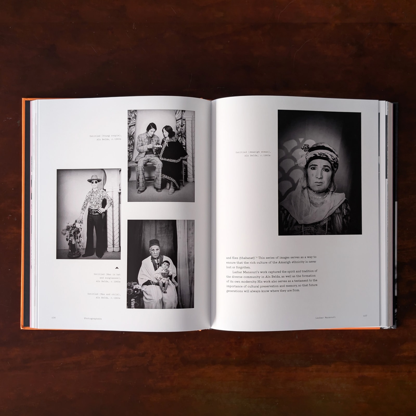 Photograph of pages in an open book featuring black and white portrait photographs by photographer Lazhar Mansouri