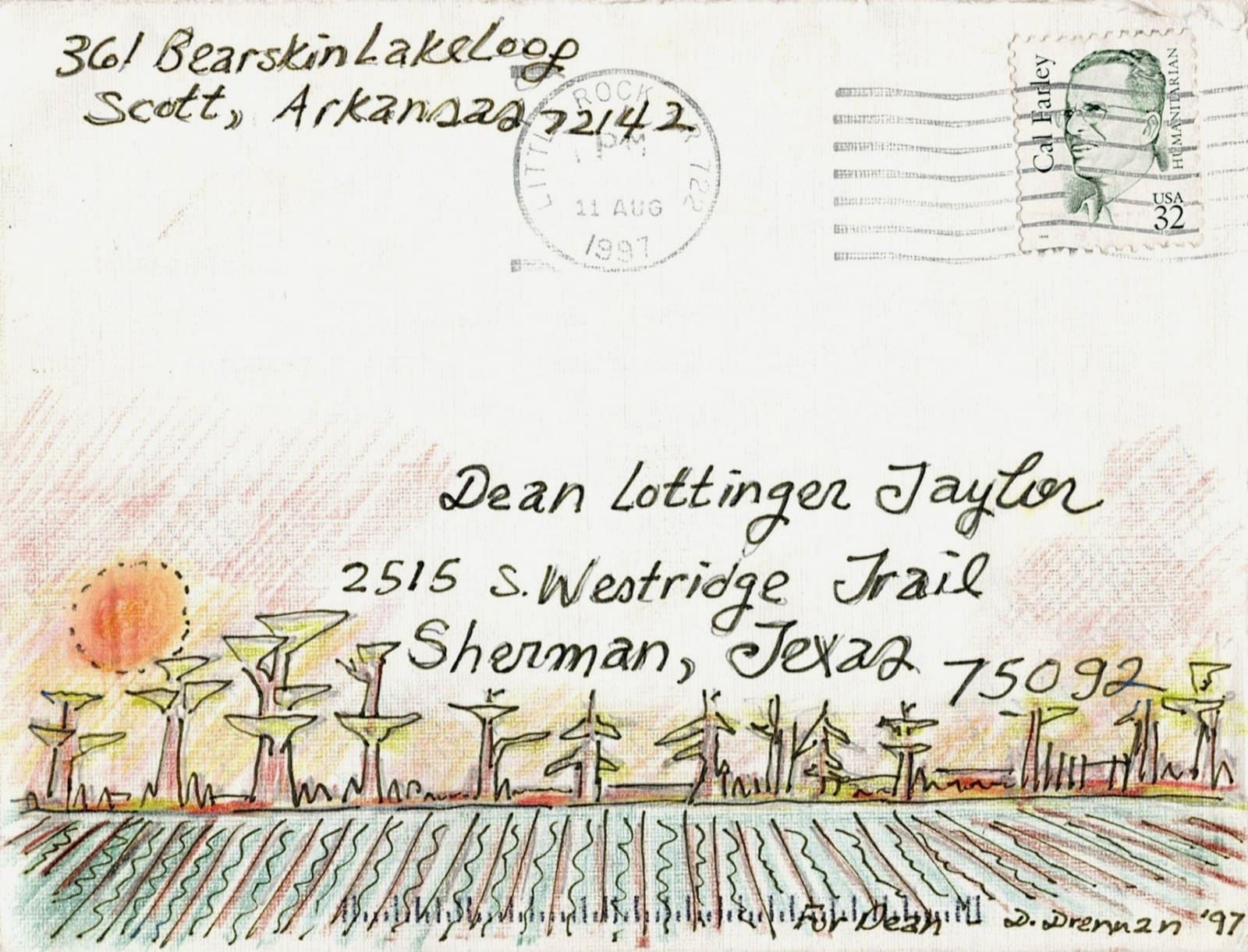 Furrowed field and cypress trees