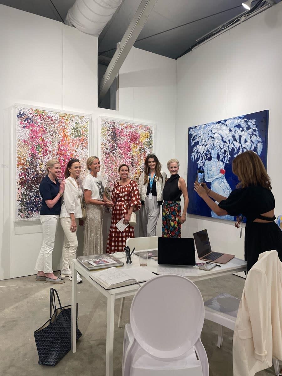 People at Carousel Fine Art's booth at the art fair, Context Art Miami 2022.