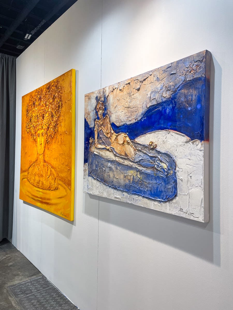 Paintings displayed at Carousel Fine Art's booth at the Palm Beach Show art fair, 2023.