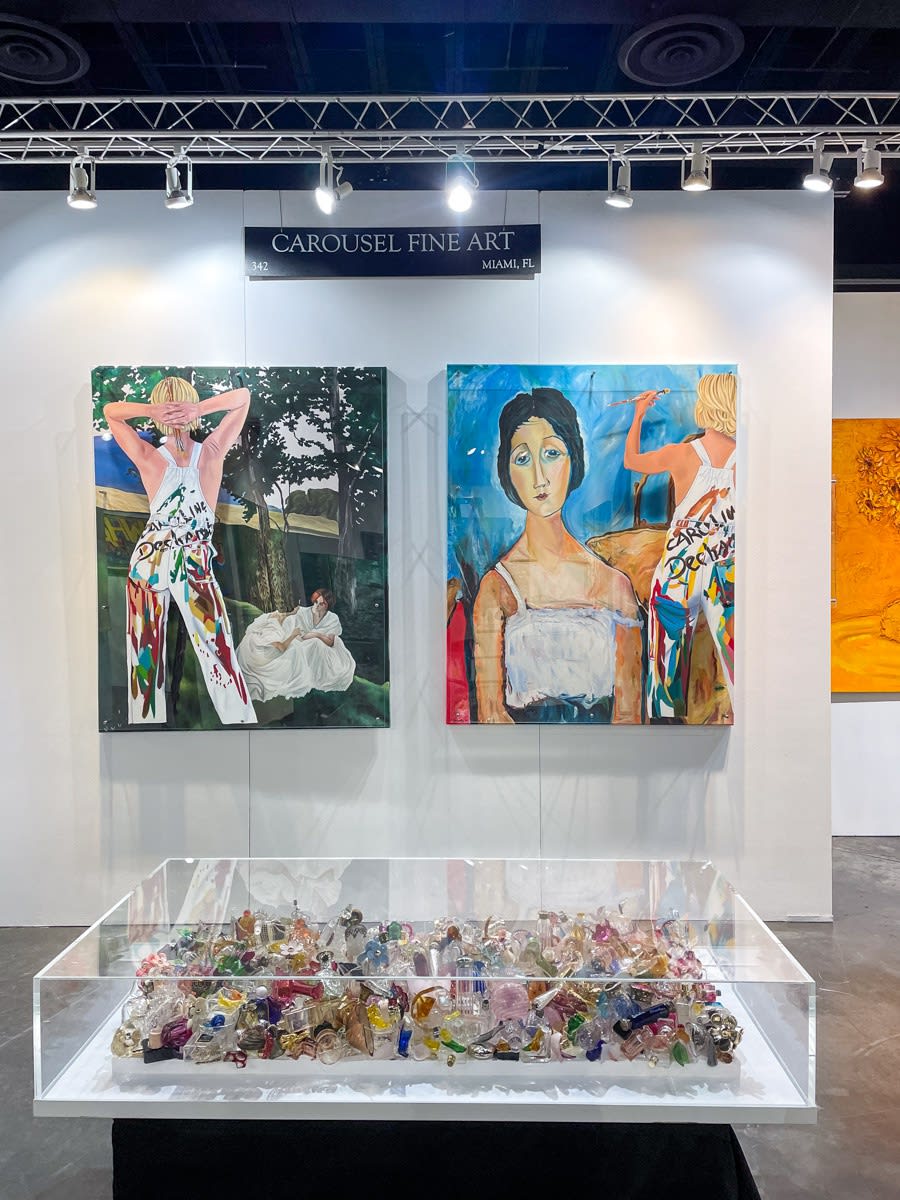 Paintings displayed at Carousel Fine Art's booth at the Palm Beach Show art fair, 2023.