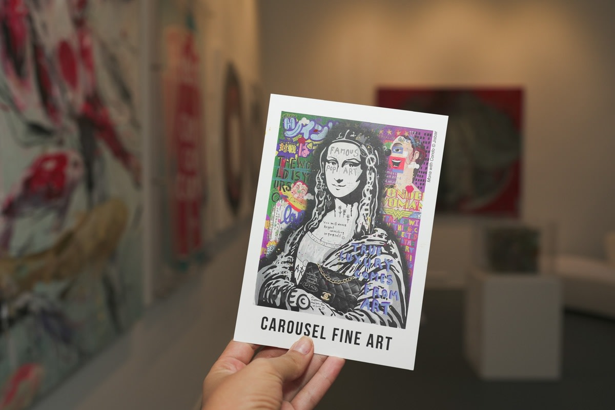Carousel Fine Art booklet in Carousel Fine Art's Miami gallery space during the Grand Opening.