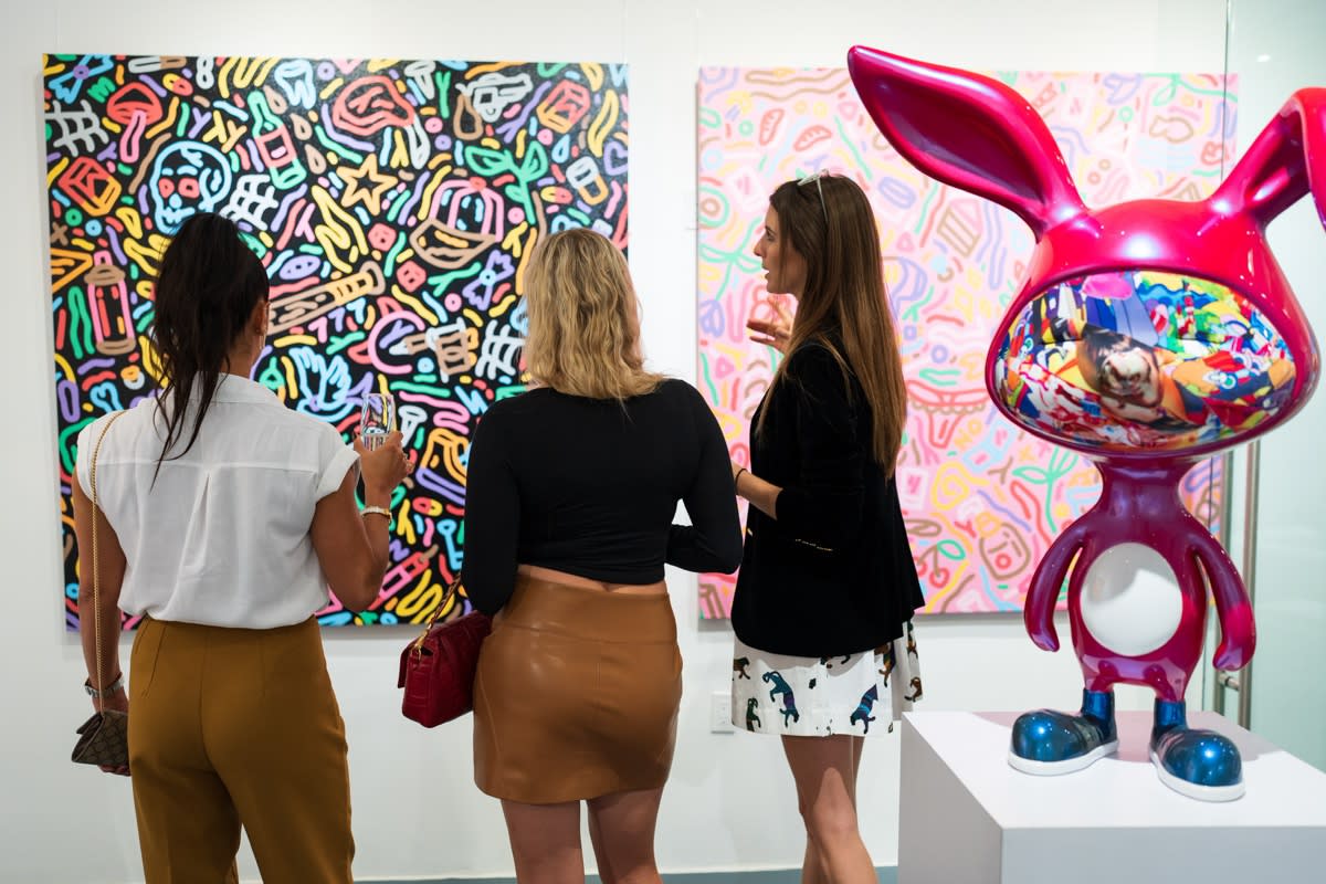 People in Carousel Fine Art's Miami gallery space during the Grand Opening.