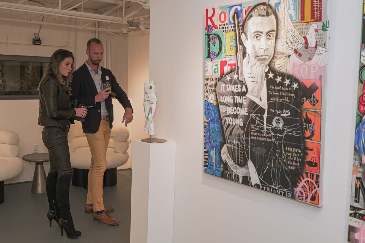 People in Carousel Fine Art's Miami gallery space during the Grand Opening.