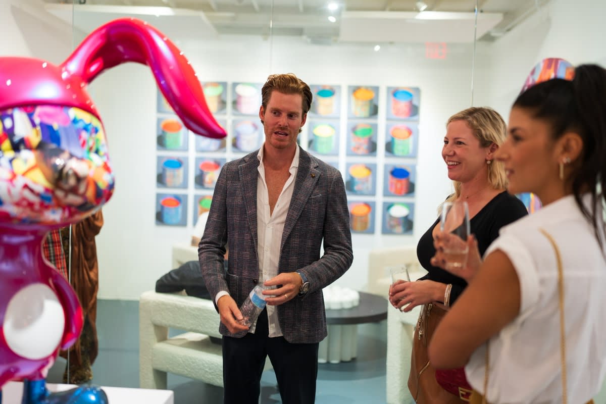 People in Carousel Fine Art's Miami gallery space during the Grand Opening.