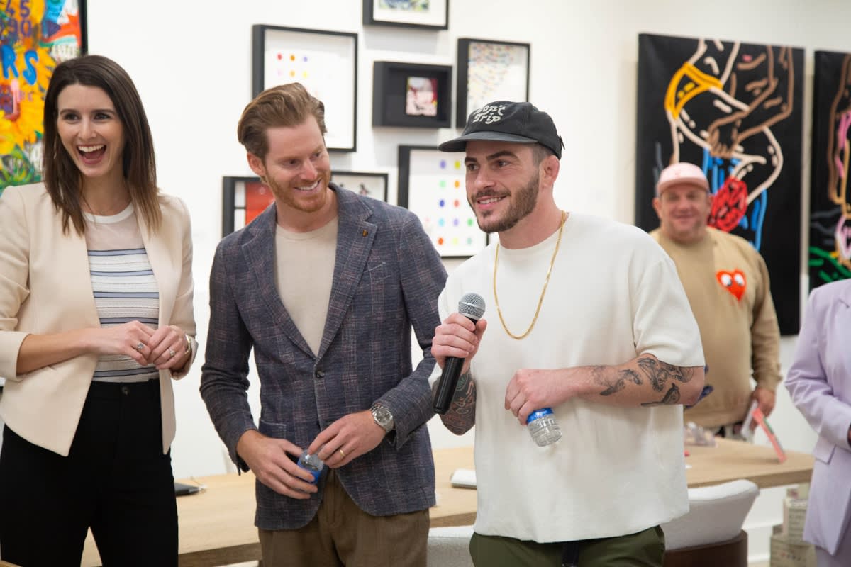 Gallery owners and artist John Westbay in Carousel Fine Art's Atlanta gallery space during the spotlight exhibition for John Westbay titled "Love, Outside the Lines."