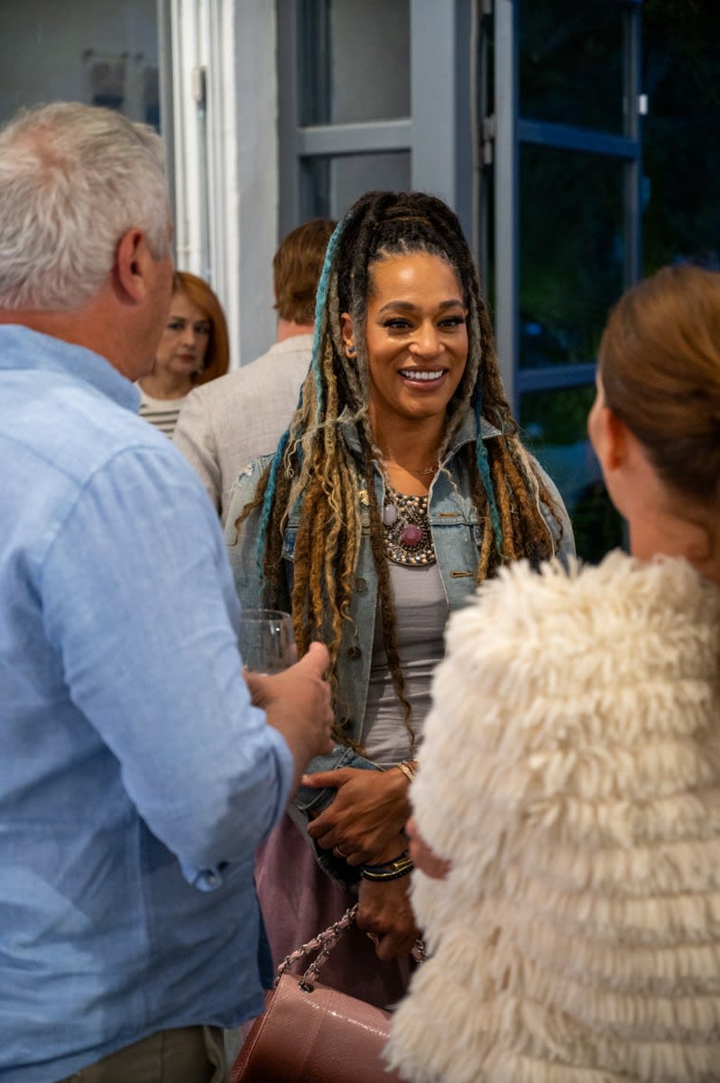 People at Carousel Fine Art's Miami gallery space for the exhibition, "If These Walls Could Talk."