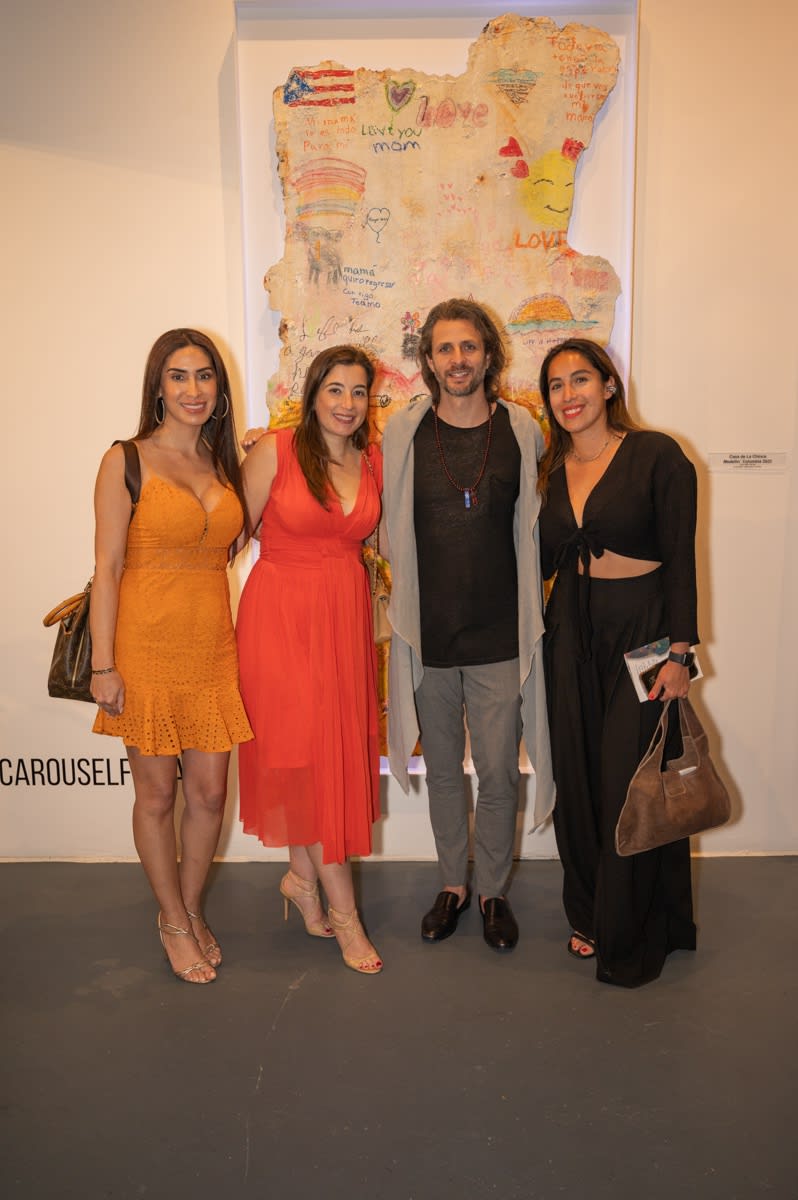 People at Carousel Fine Art's Miami gallery space for the exhibition, "If These Walls Could Talk."