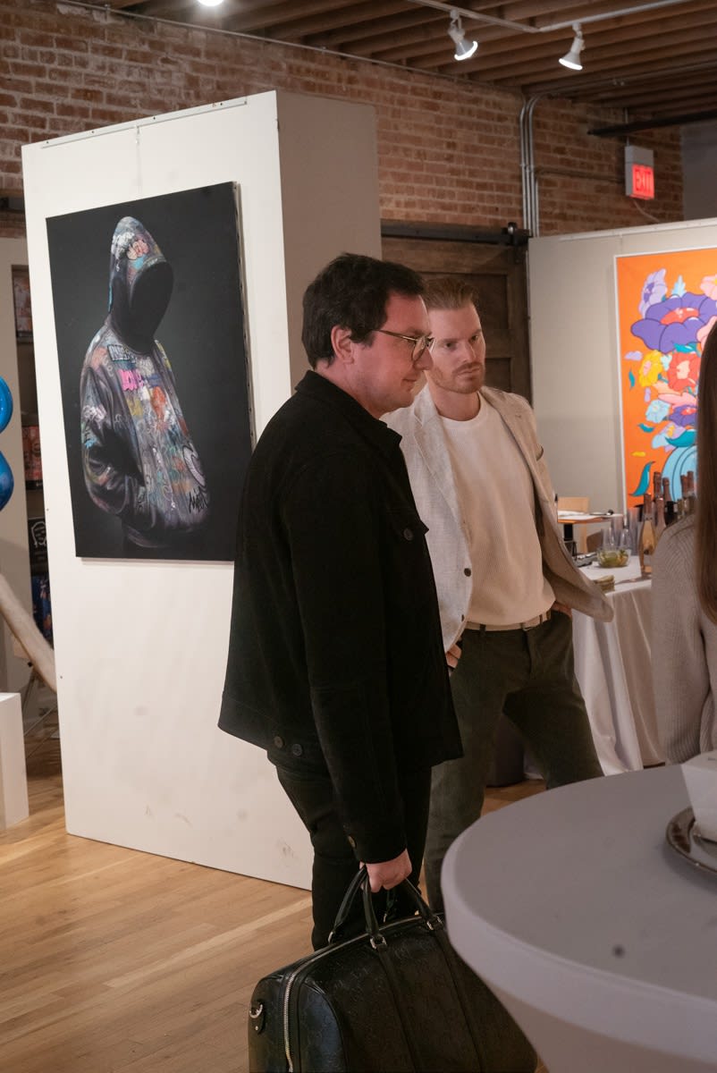 People in Carousel Fine Art's Chicago gallery space during the Chicago Grand Opening.