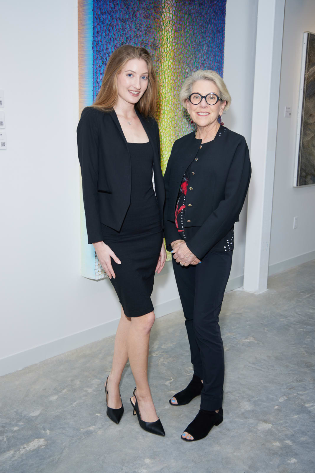 Advisor and collector standing together in evening attire at Carousel Fine Art’s NORA District West Palm event.