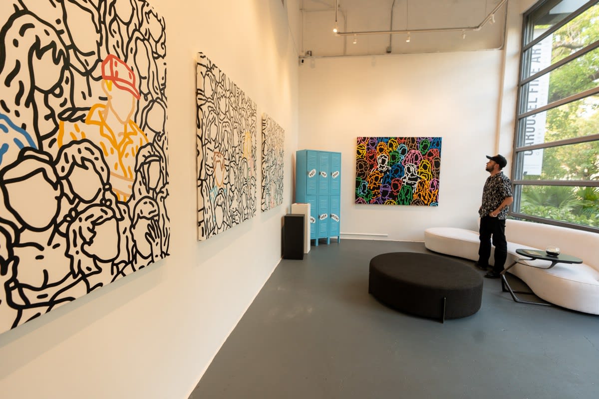 Carousel Fine Art's gallery space in Miami, FL during Chance Cooper's Spotlight Exhibition, "Between Me and You."
