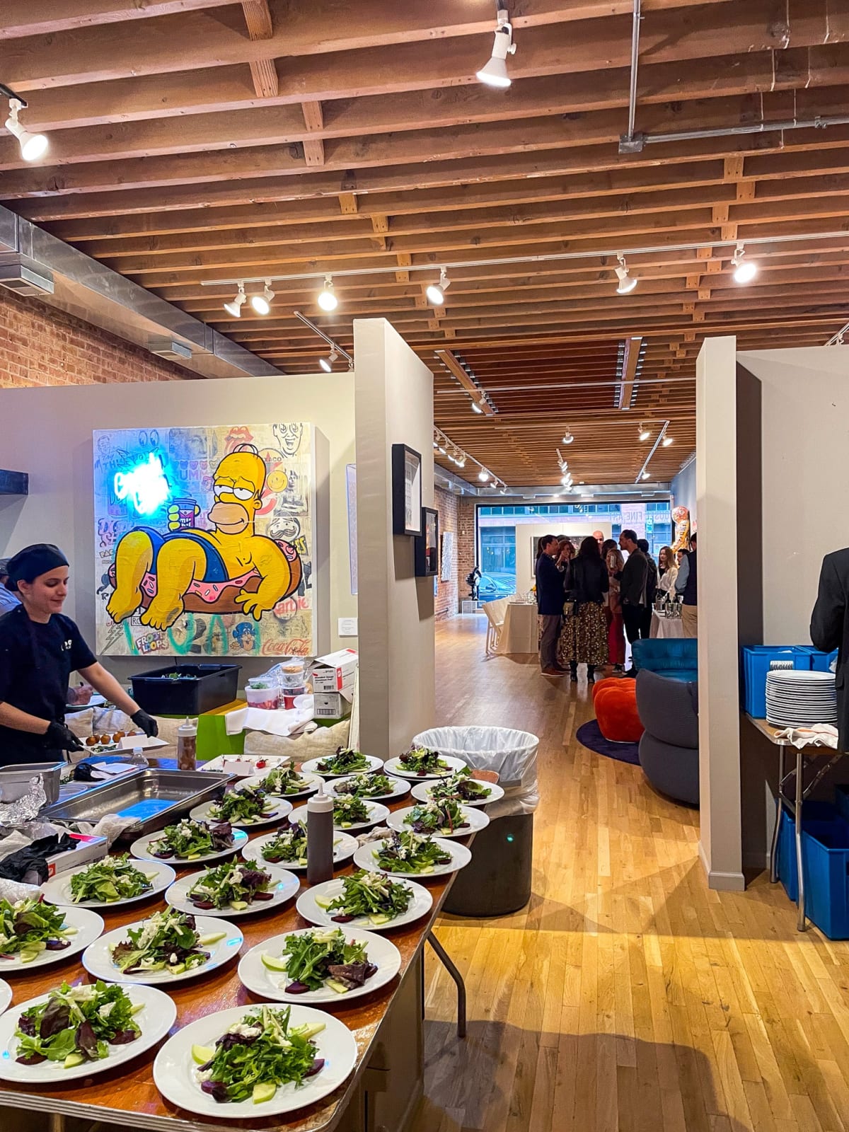 Table with food for Collector's Dinner at Carousel Fine Art's gallery space in Chicago.