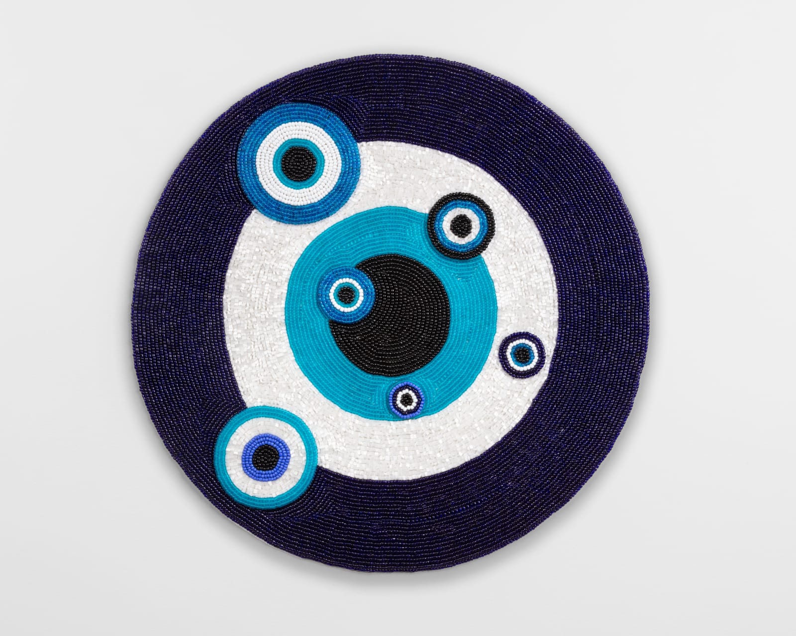 Marie Watt, A Million Eyes (Shield), 2024