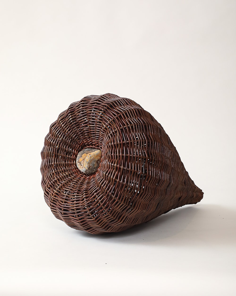 Joe Hogan, Two Reclining Willow Pods With A Lichen-Marked Stone