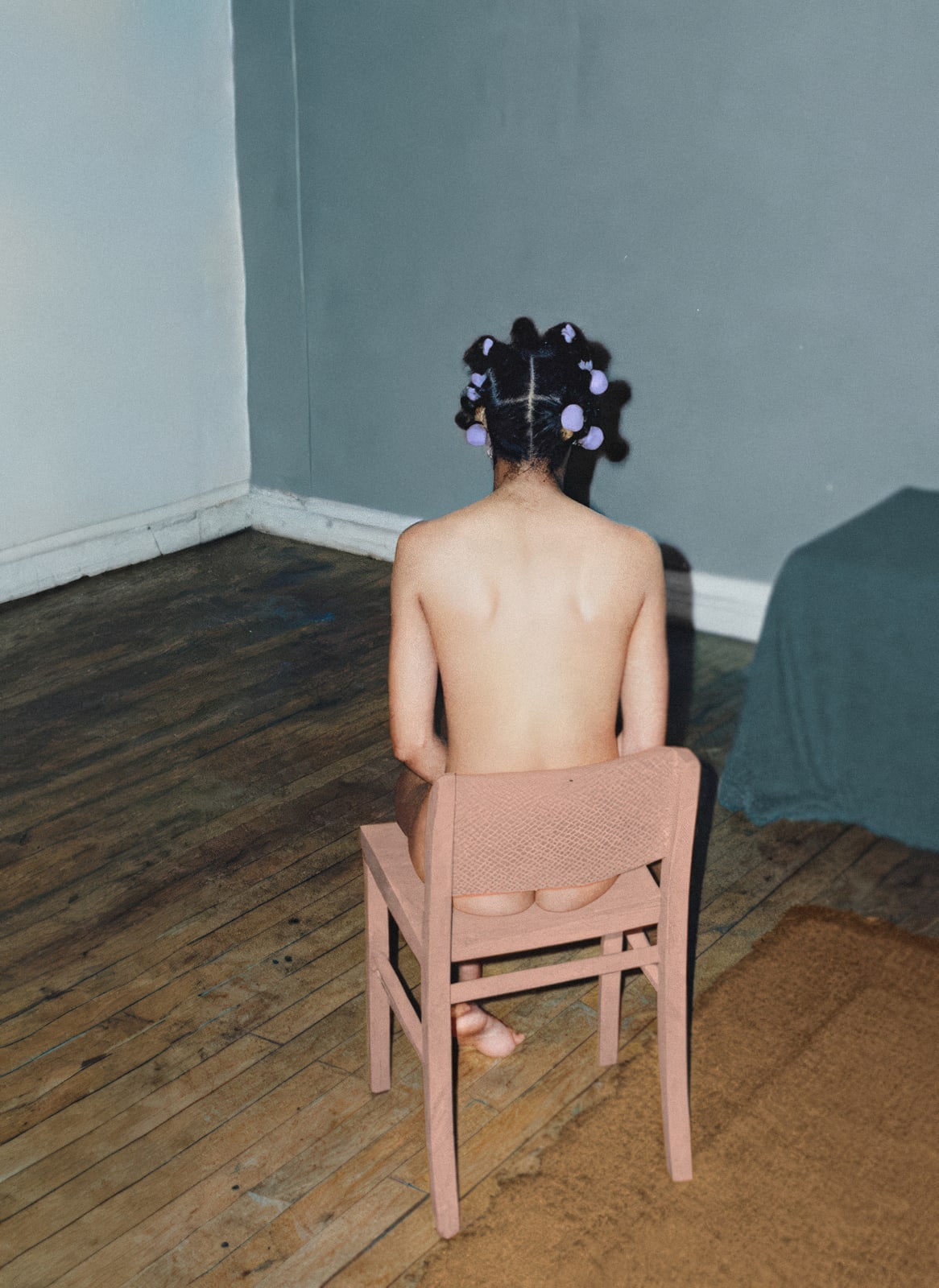 Tamika in a chair, Circa (Never)
