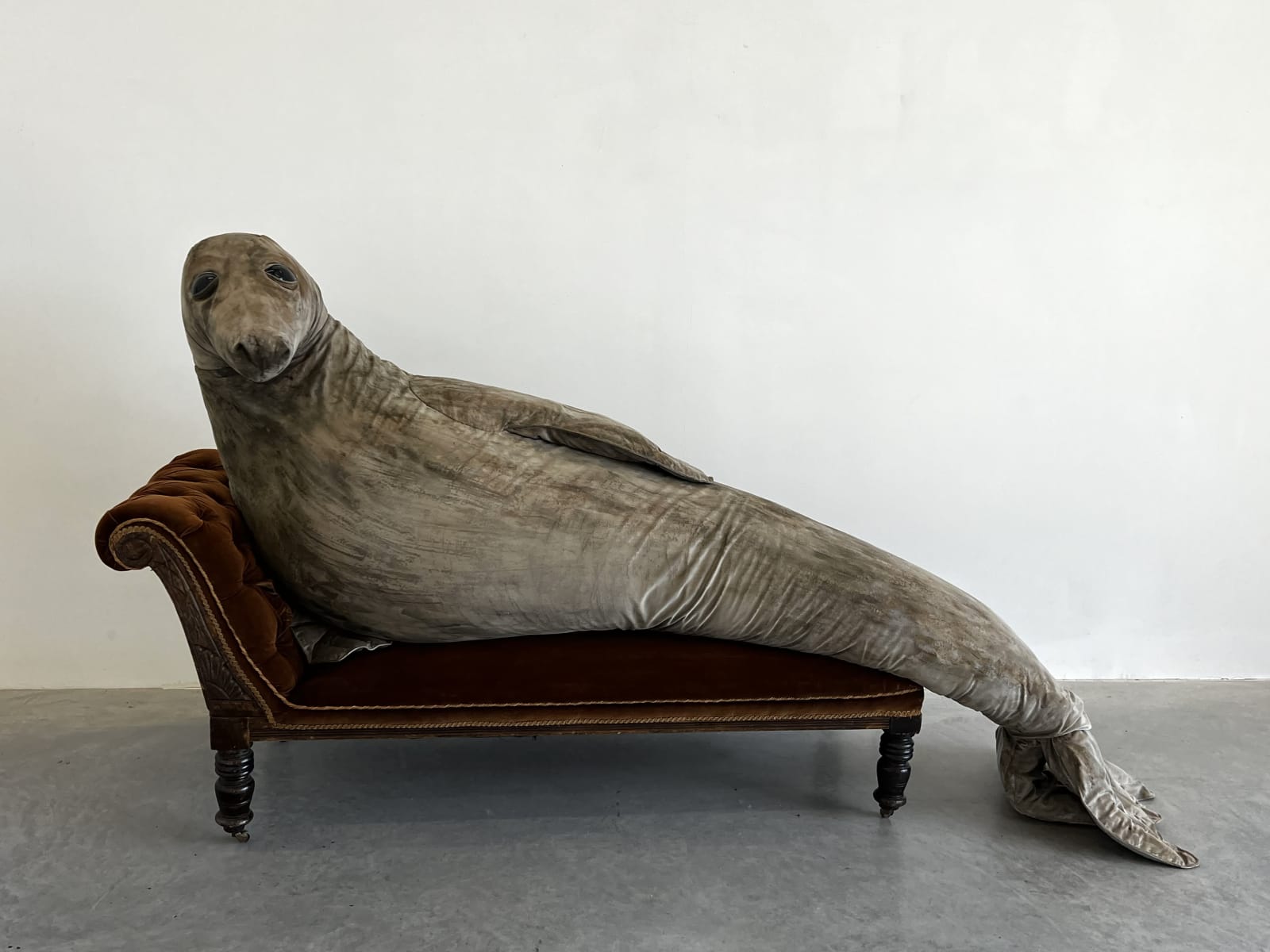 Laura Ford, Reclining Seal, sculptural installation (Chaise longue and seal), 2025