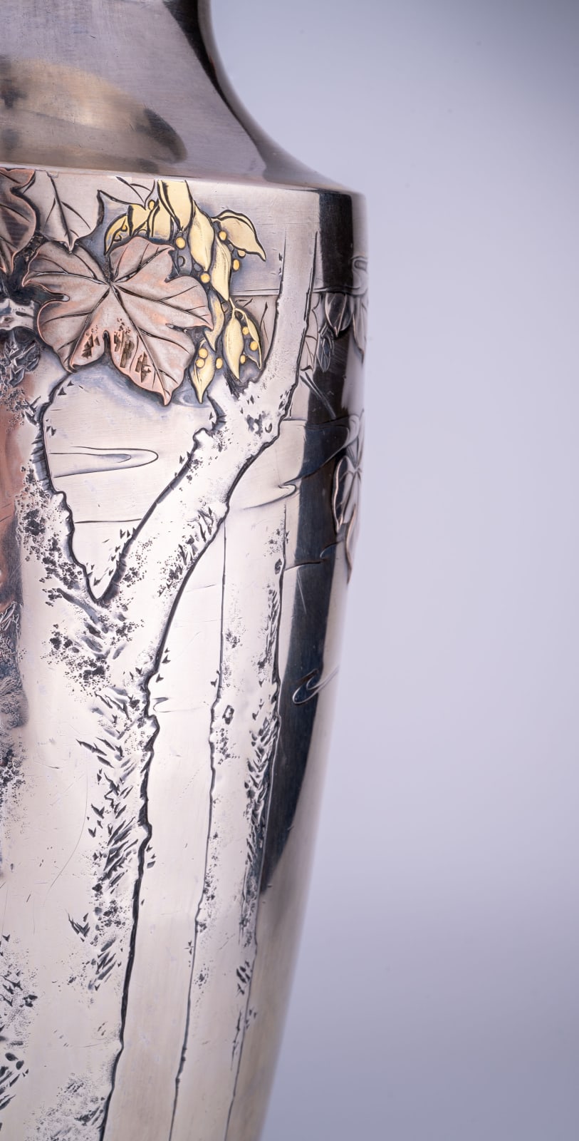 Kagawa Katsuhiro, A Japanese silver vase with gilt accents, Meiji