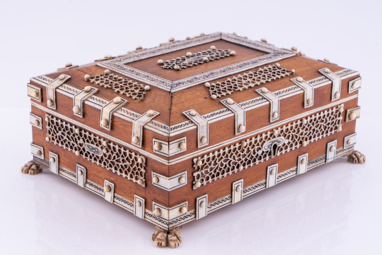 Vizagapatam, An Anglo-Indian ivory mounted sandalwood casket, c. 1930